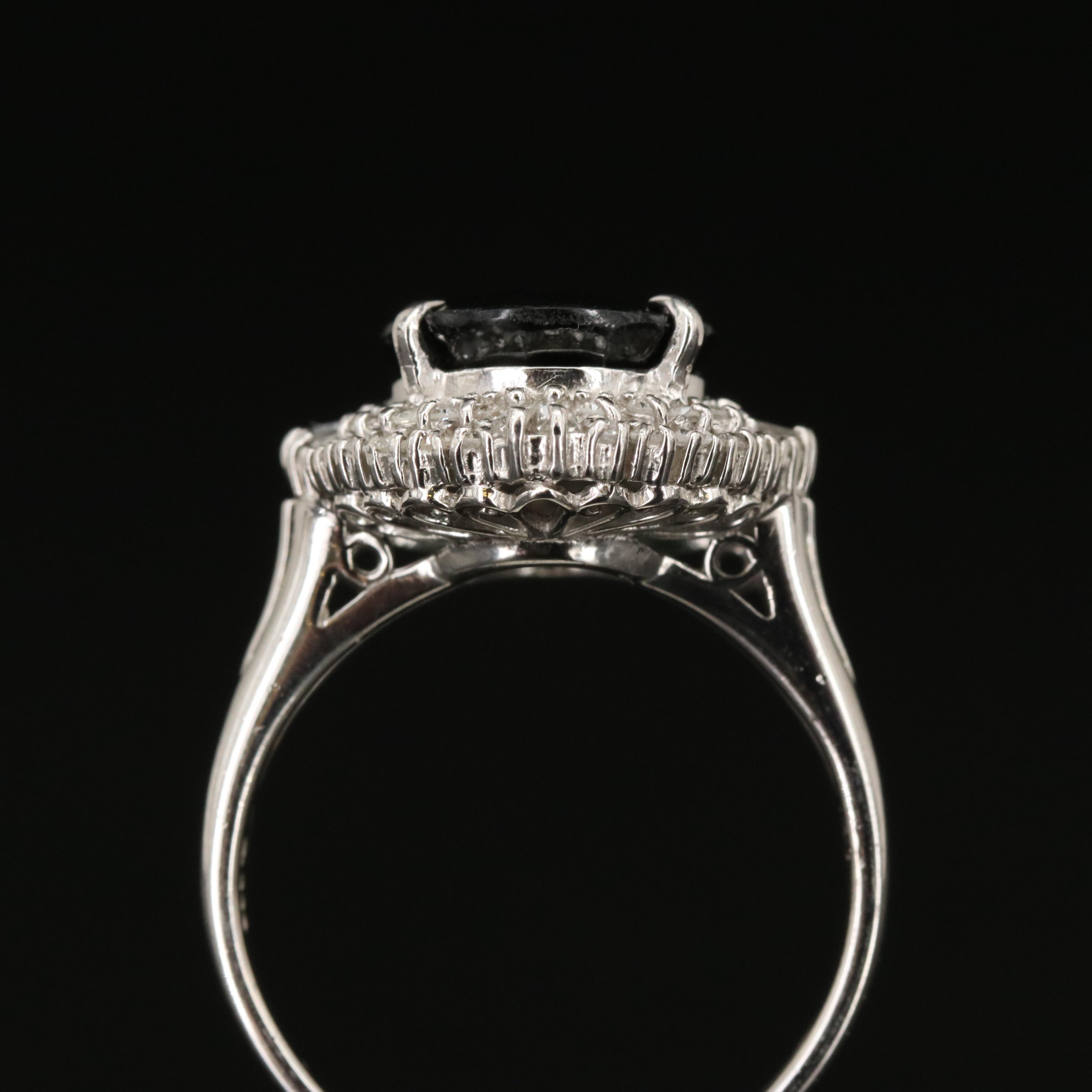 Platinum Sapphire and Diamond Oval Ring