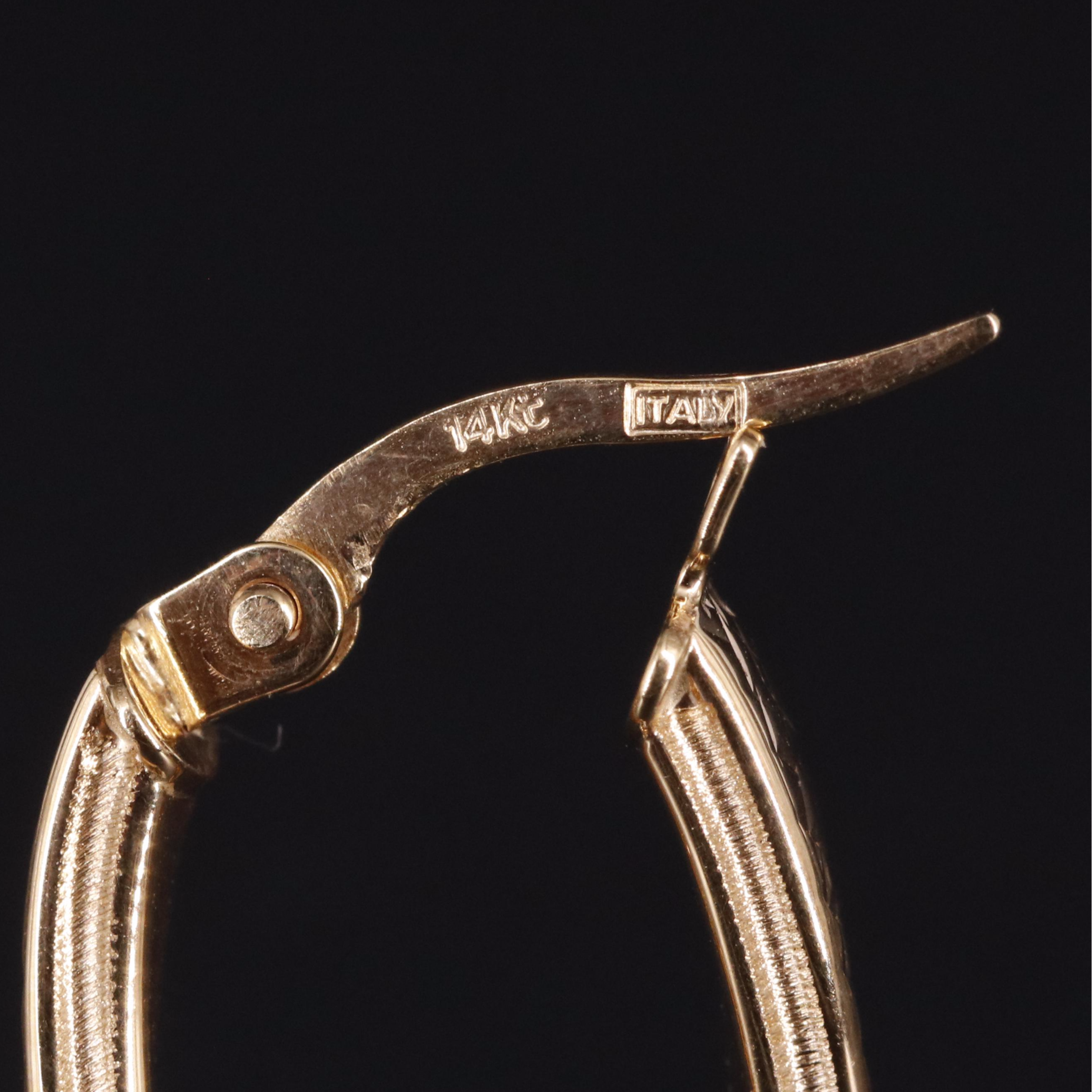 14K Twisted Oval Latch Back Hoop Earrings