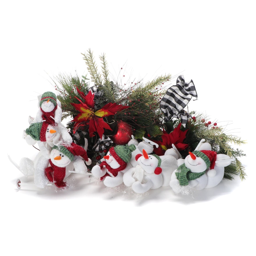 Plush Ice Skating Snowmen and Artificial Pine Garland with Bows, Holly and More
