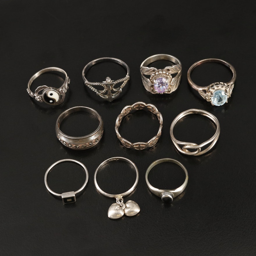 Sterling, Topaz, Yin and Yang and Peace Signs Featured in Ring Selection