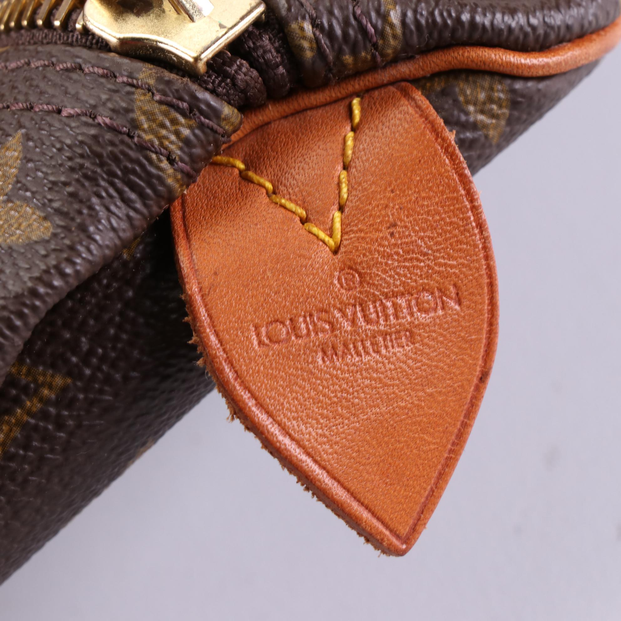 Louis Vuitton Malletier Keepall 55 in Monogram Canvas and Vachetta Leather