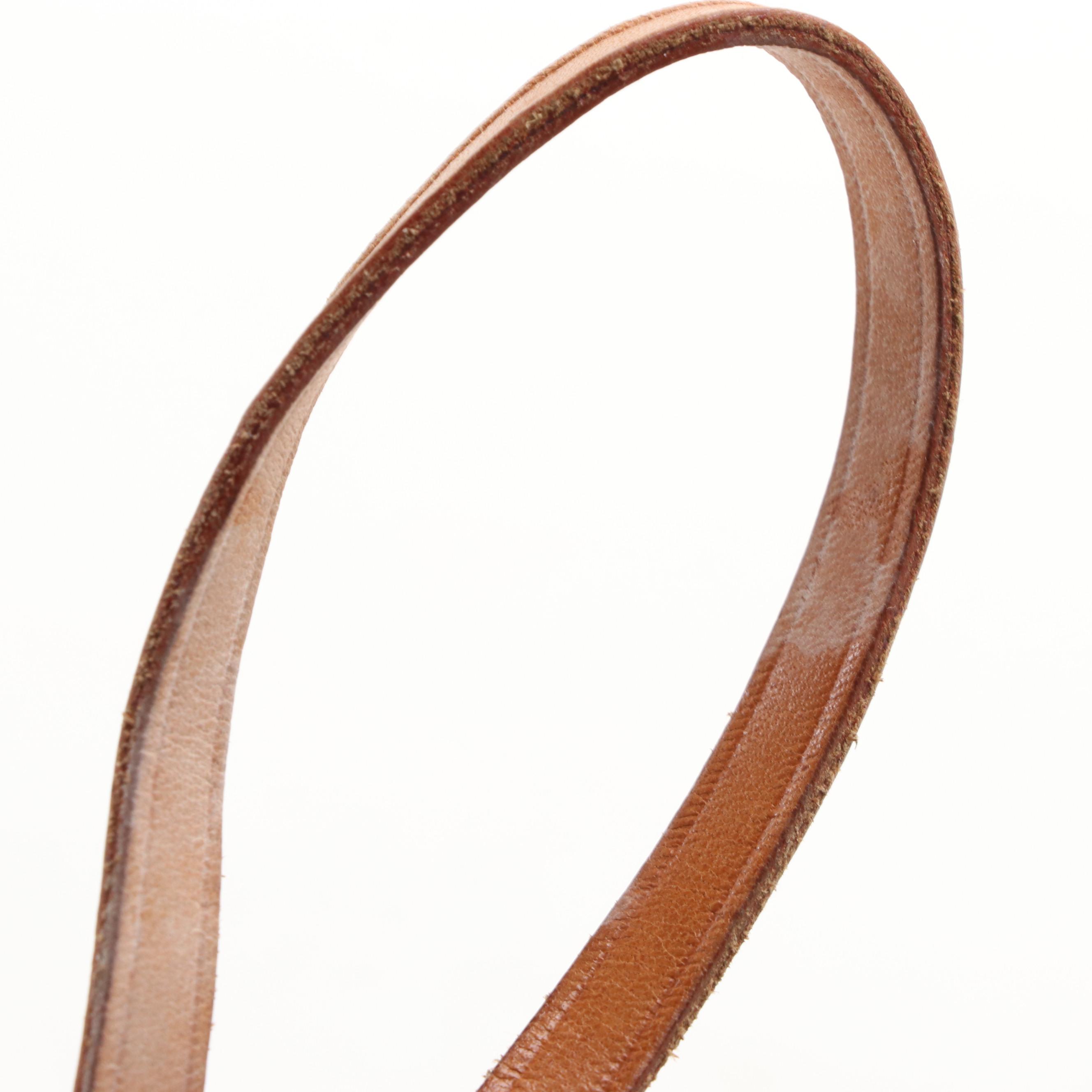 Louis Vuitton Pochette Accessories in Monogram Canvas and Vachetta Leather