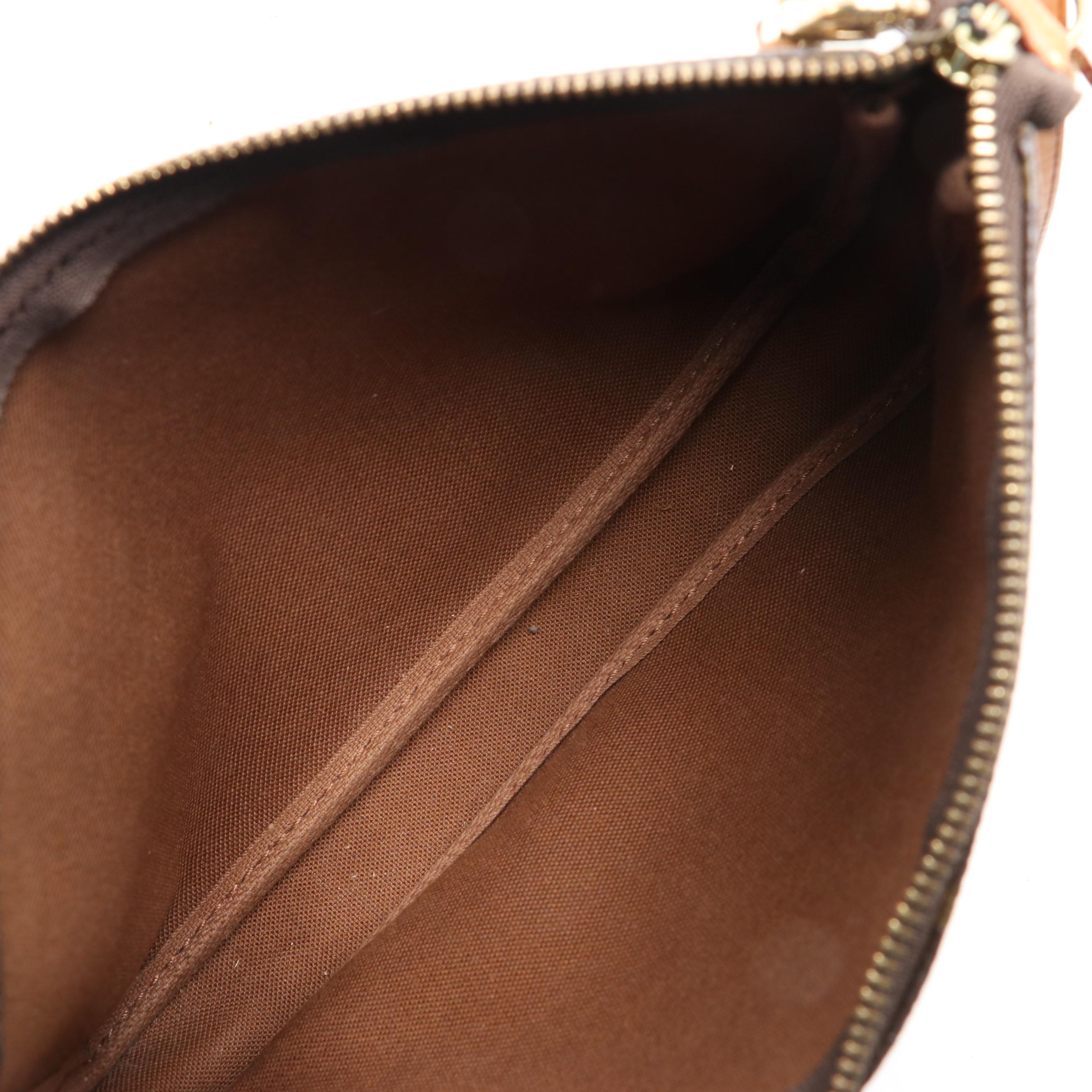 Louis Vuitton Pochette Accessories in Monogram Canvas and Vachetta Leather