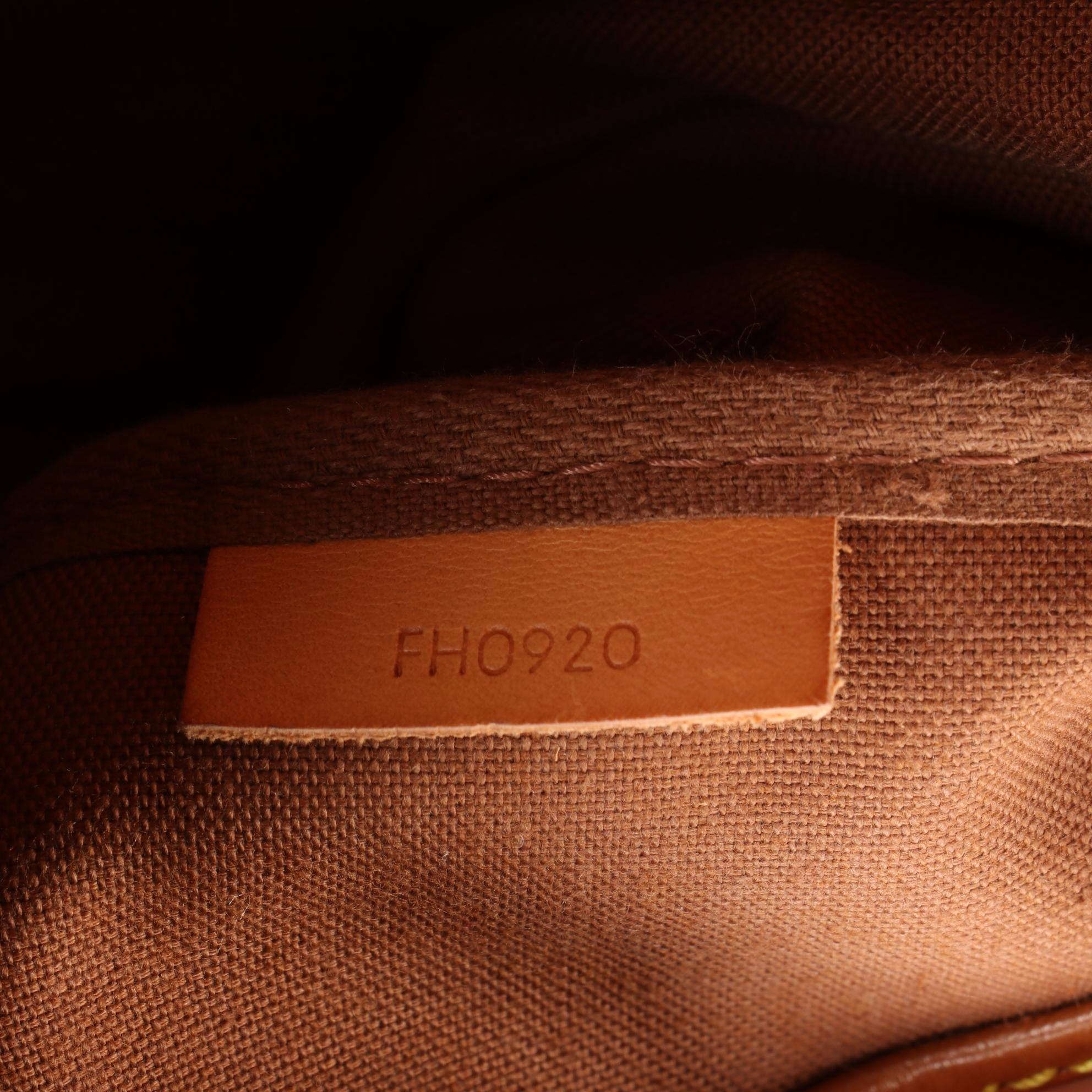 Louis Vuitton Saumur 35 Messenger Bag in Monogram Canvas and Vachetta Leather