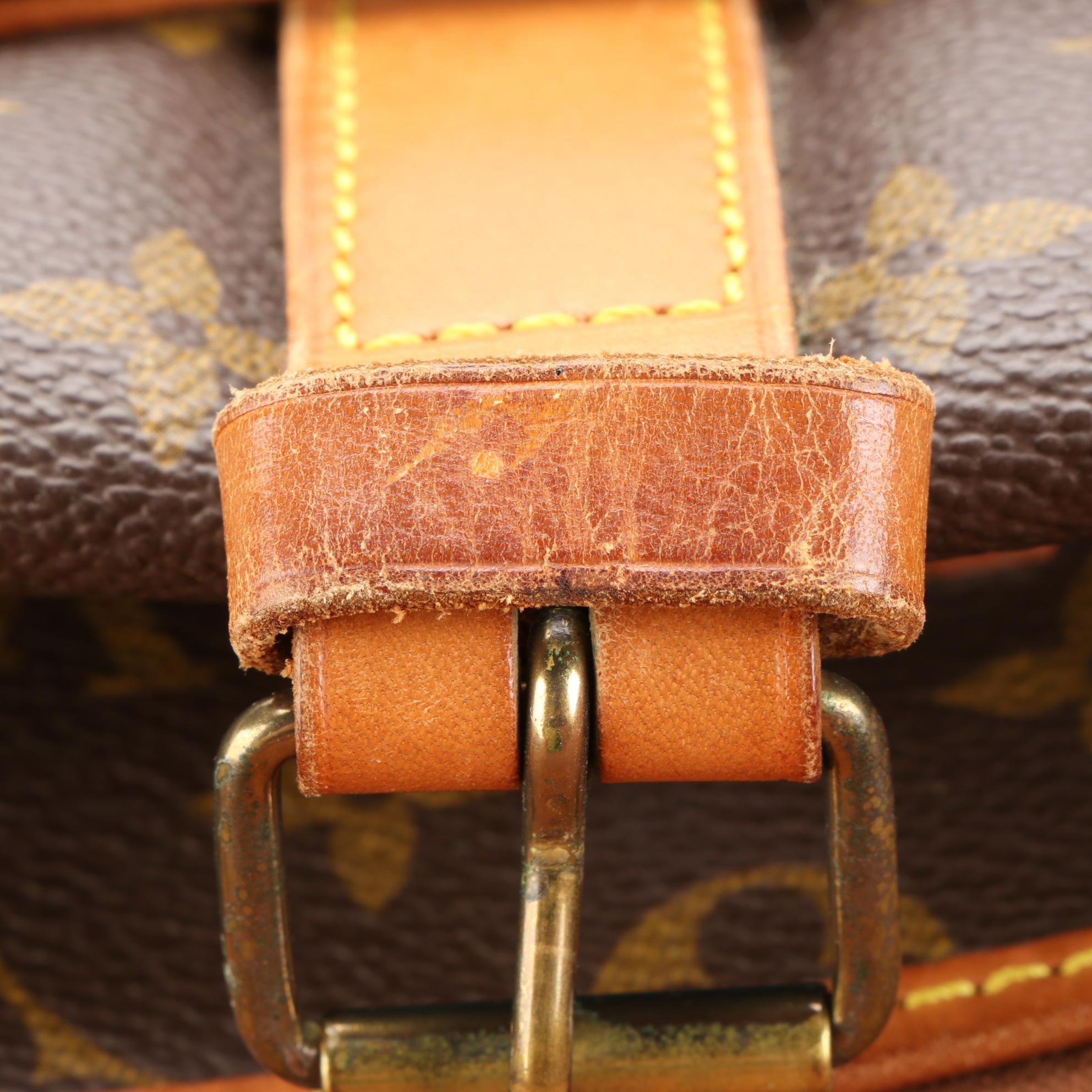 Louis Vuitton Saumur 35 Messenger Bag in Monogram Canvas and Vachetta Leather