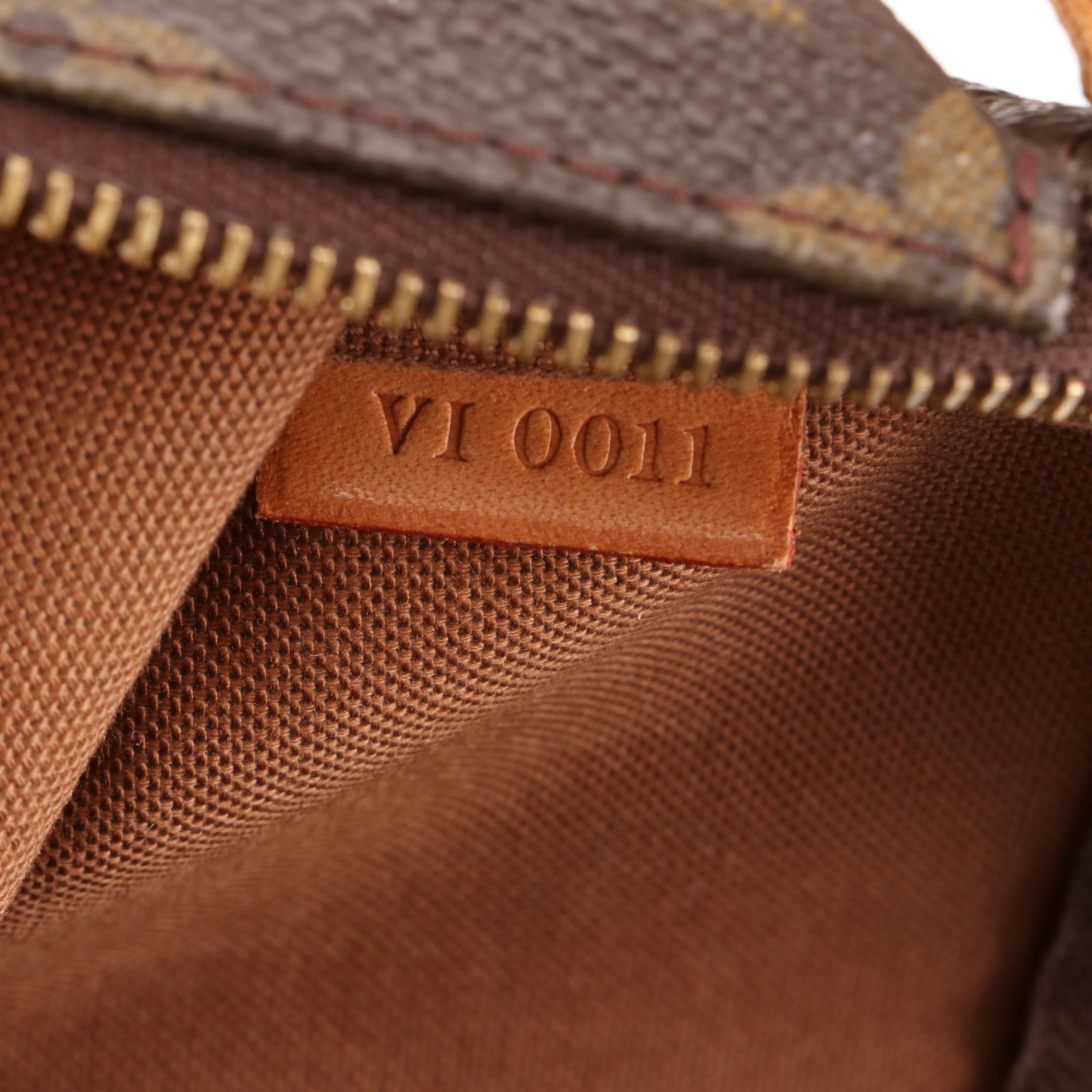 Louis Vuitton Pochette Accessories in Monogram Canvas and Vachetta Leather