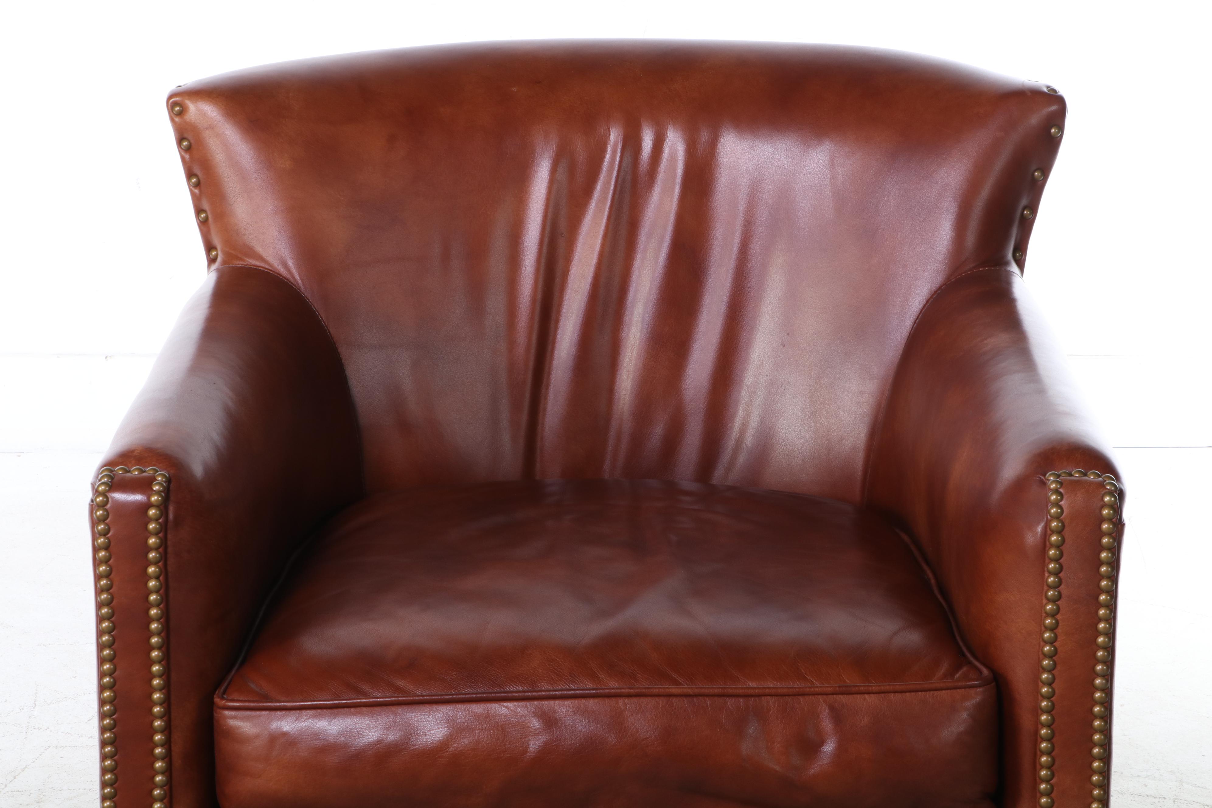 Century Leather and Brass-Tacked Armchair and Leathercraft Ottoman