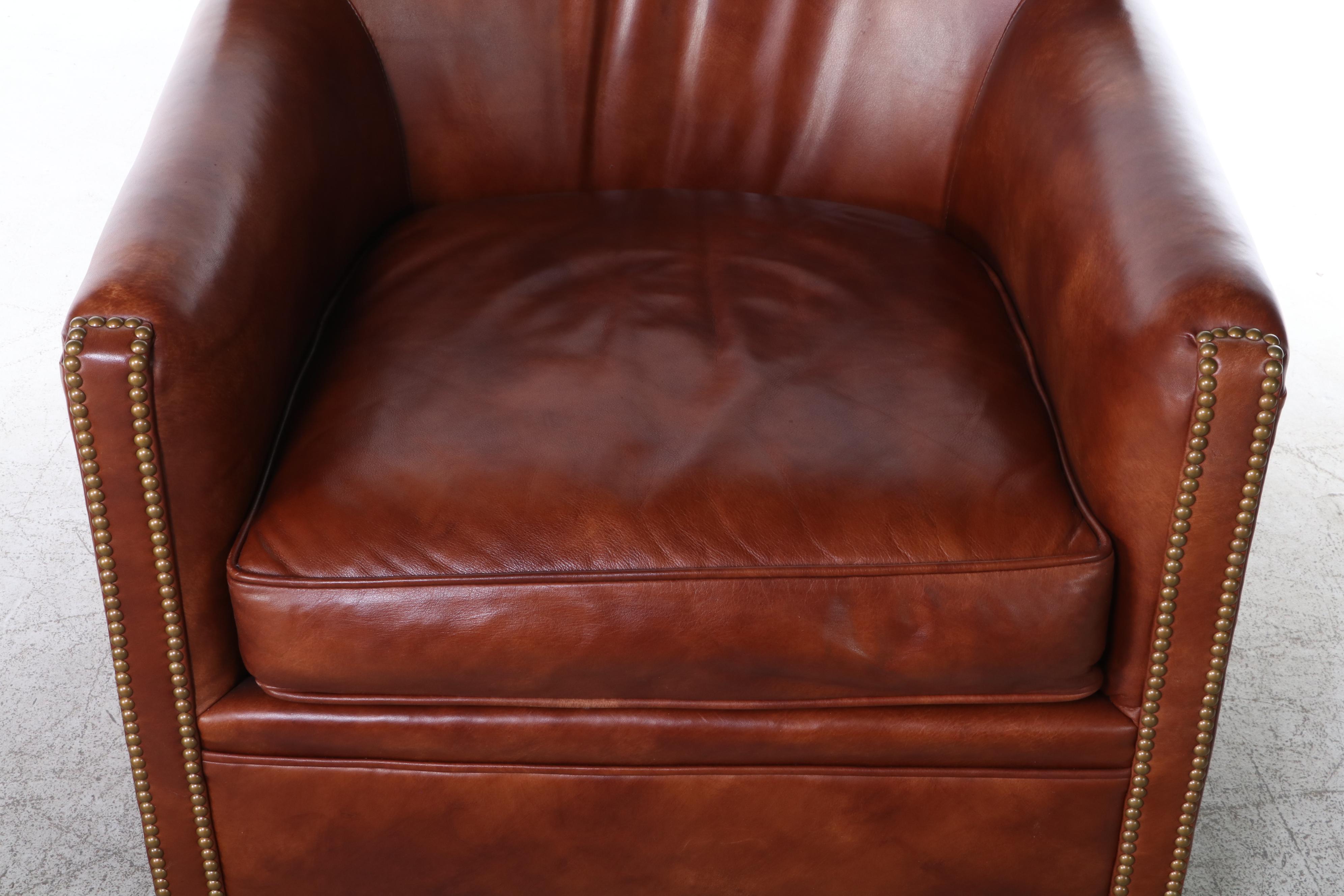 Century Leather and Brass-Tacked Armchair and Leathercraft Ottoman