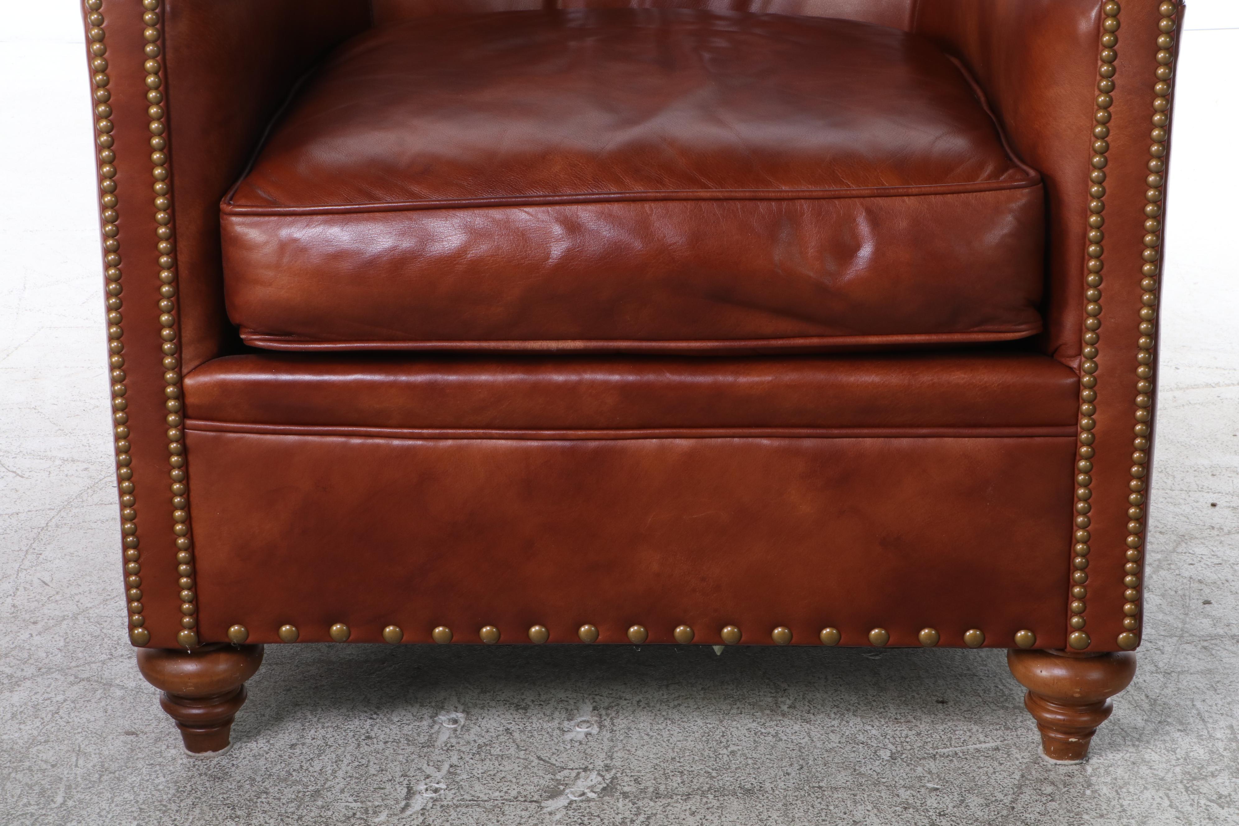 Century Leather and Brass-Tacked Armchair and Leathercraft Ottoman
