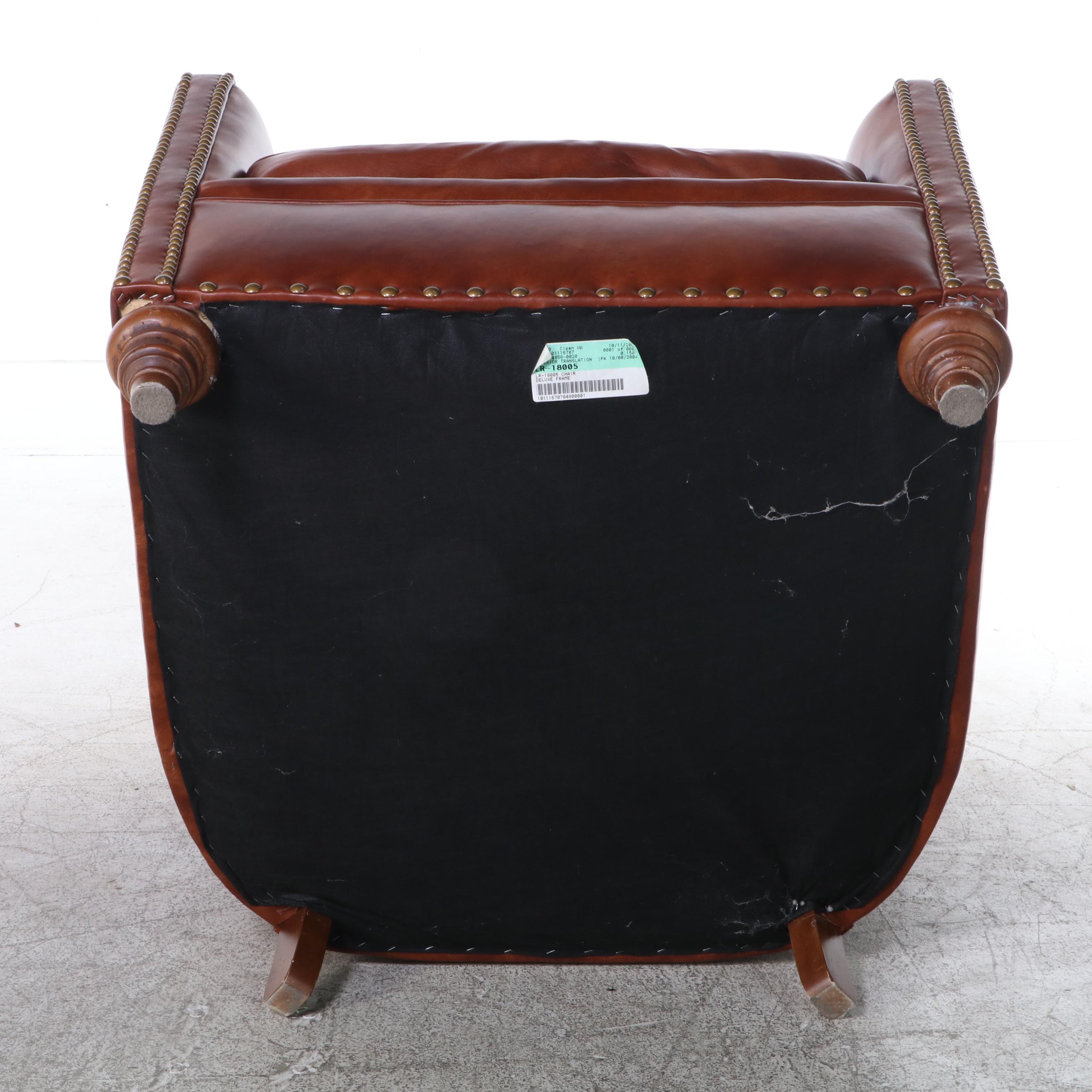 Century Leather and Brass-Tacked Armchair and Leathercraft Ottoman