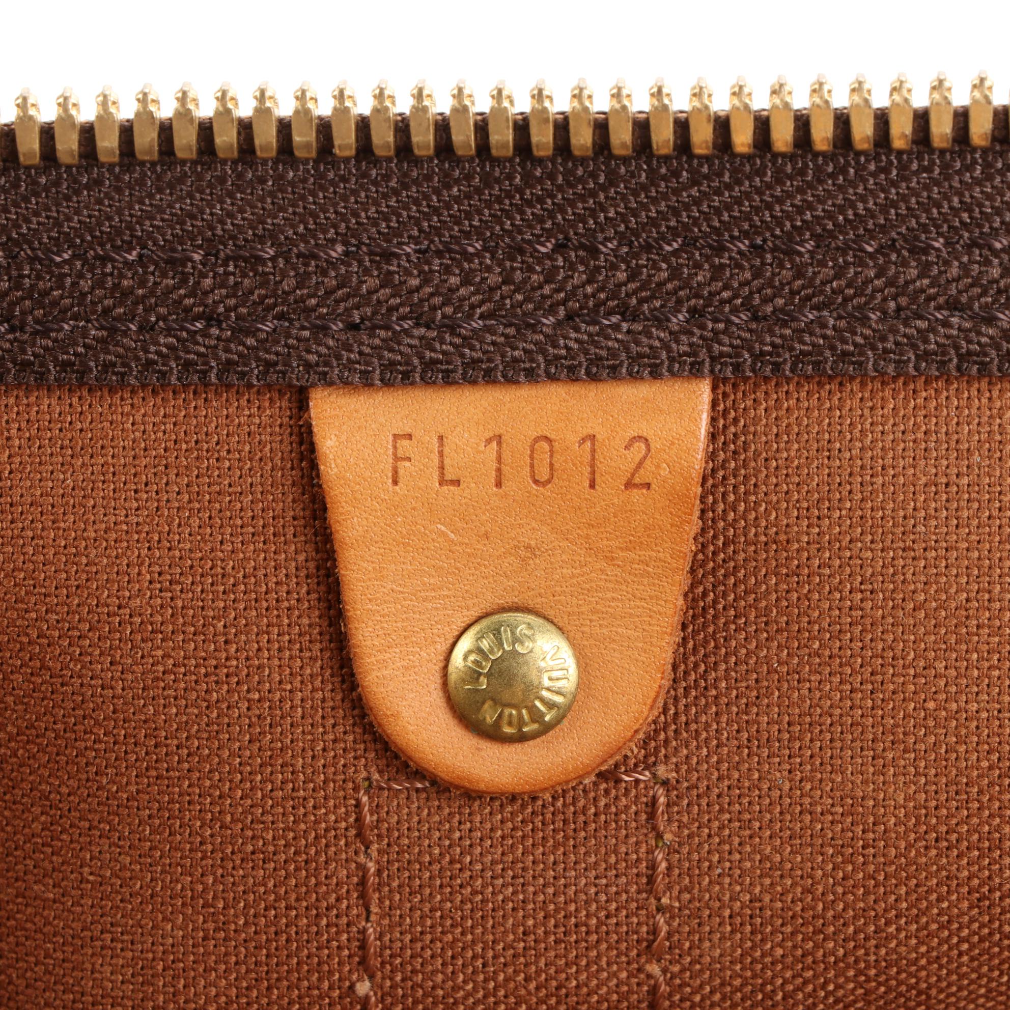 Louis Vuitton Keepall 60 Bandoulière in Monogram Canvas and Vachetta Leather