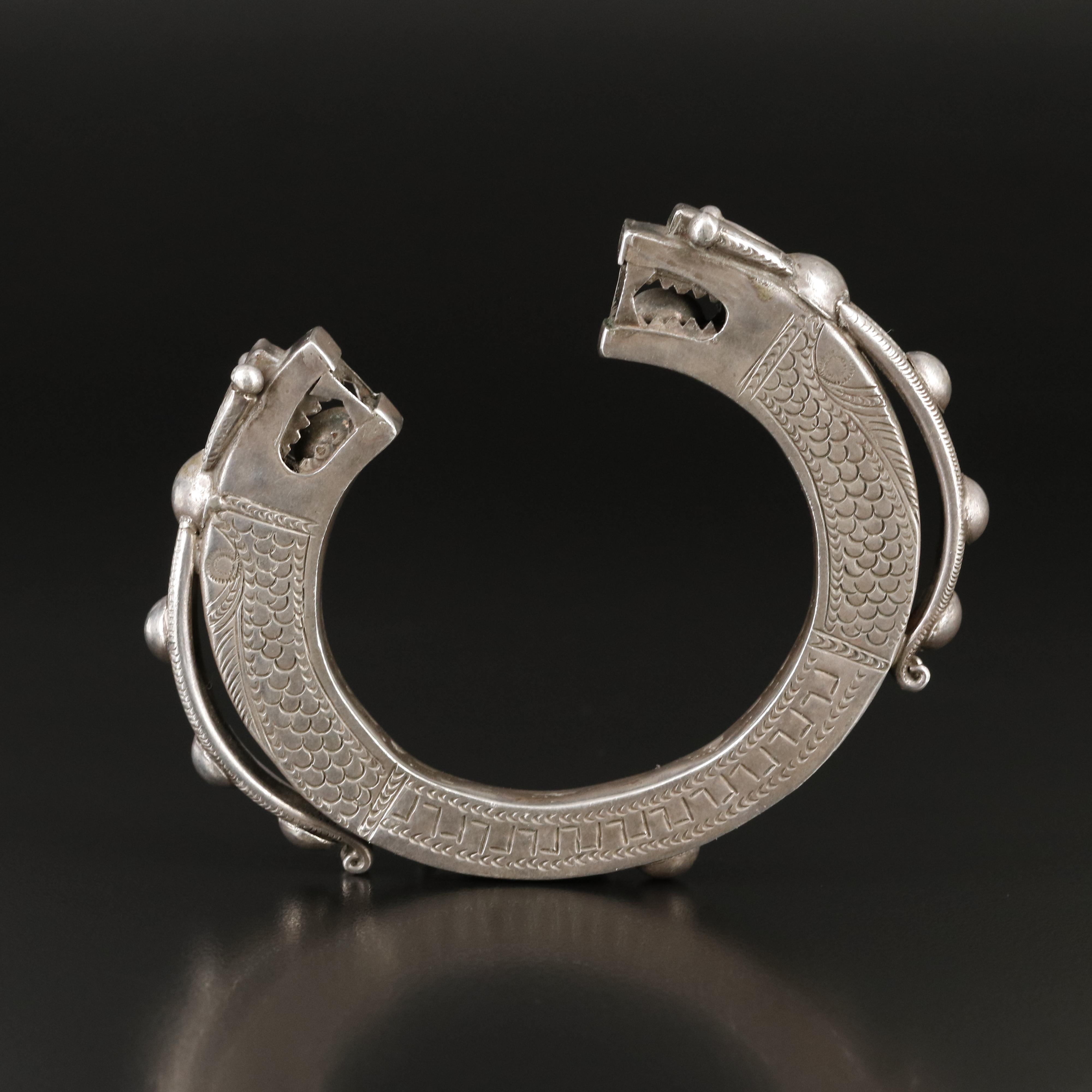 Vintage Laos Tai Lue Engraved Bangle with Dragon Terminals