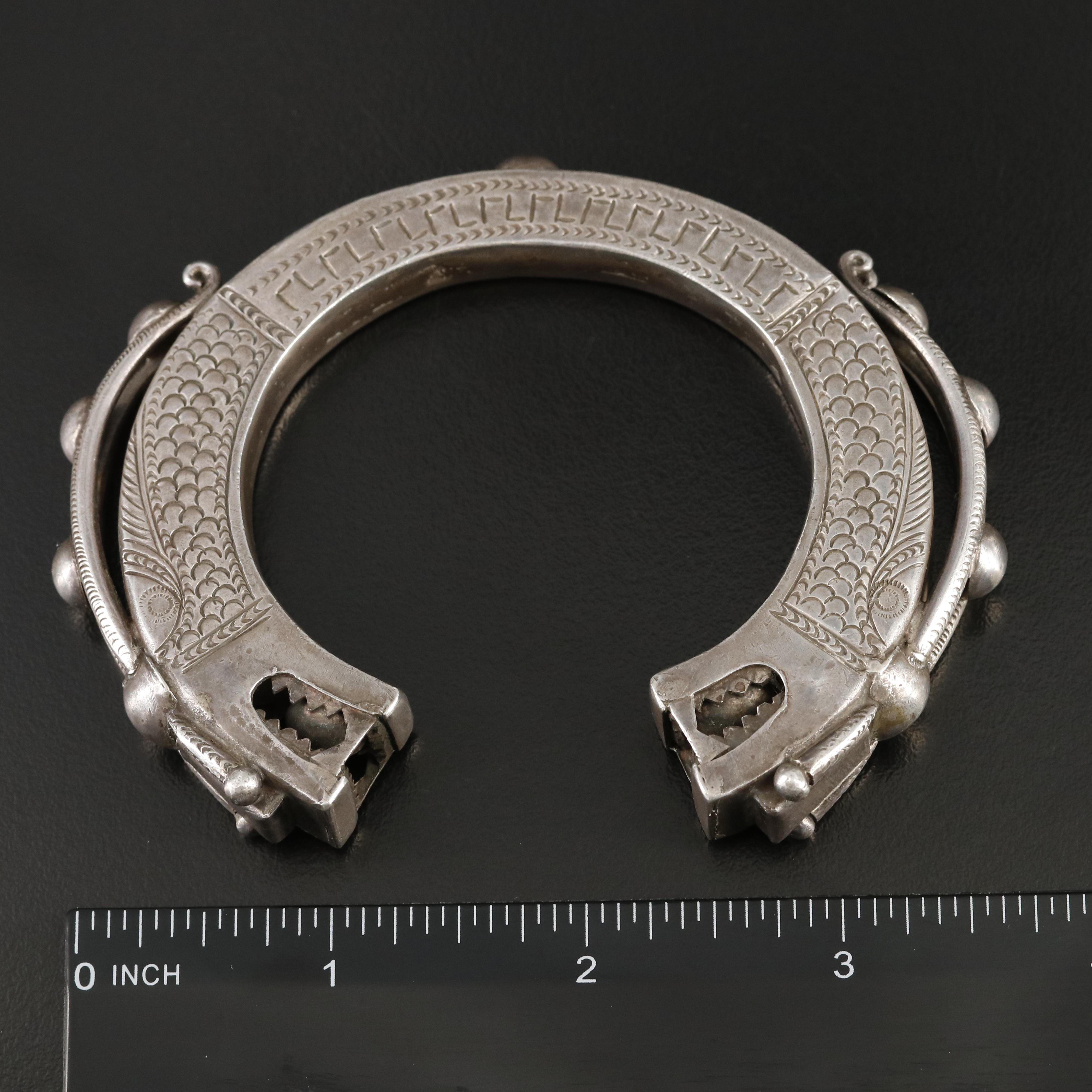 Vintage Laos Tai Lue Engraved Bangle with Dragon Terminals