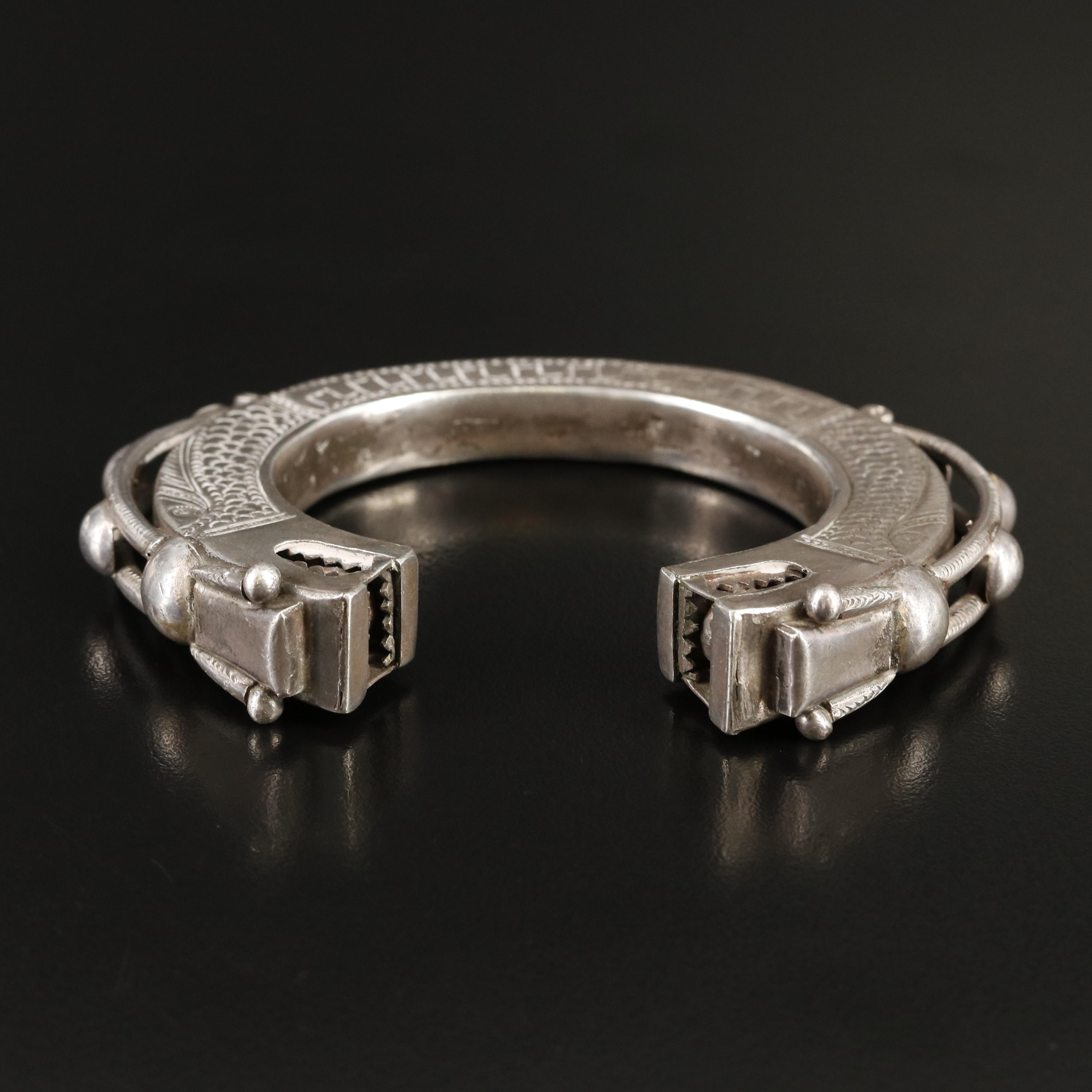 Vintage Laos Tai Lue Engraved Bangle with Dragon Terminals