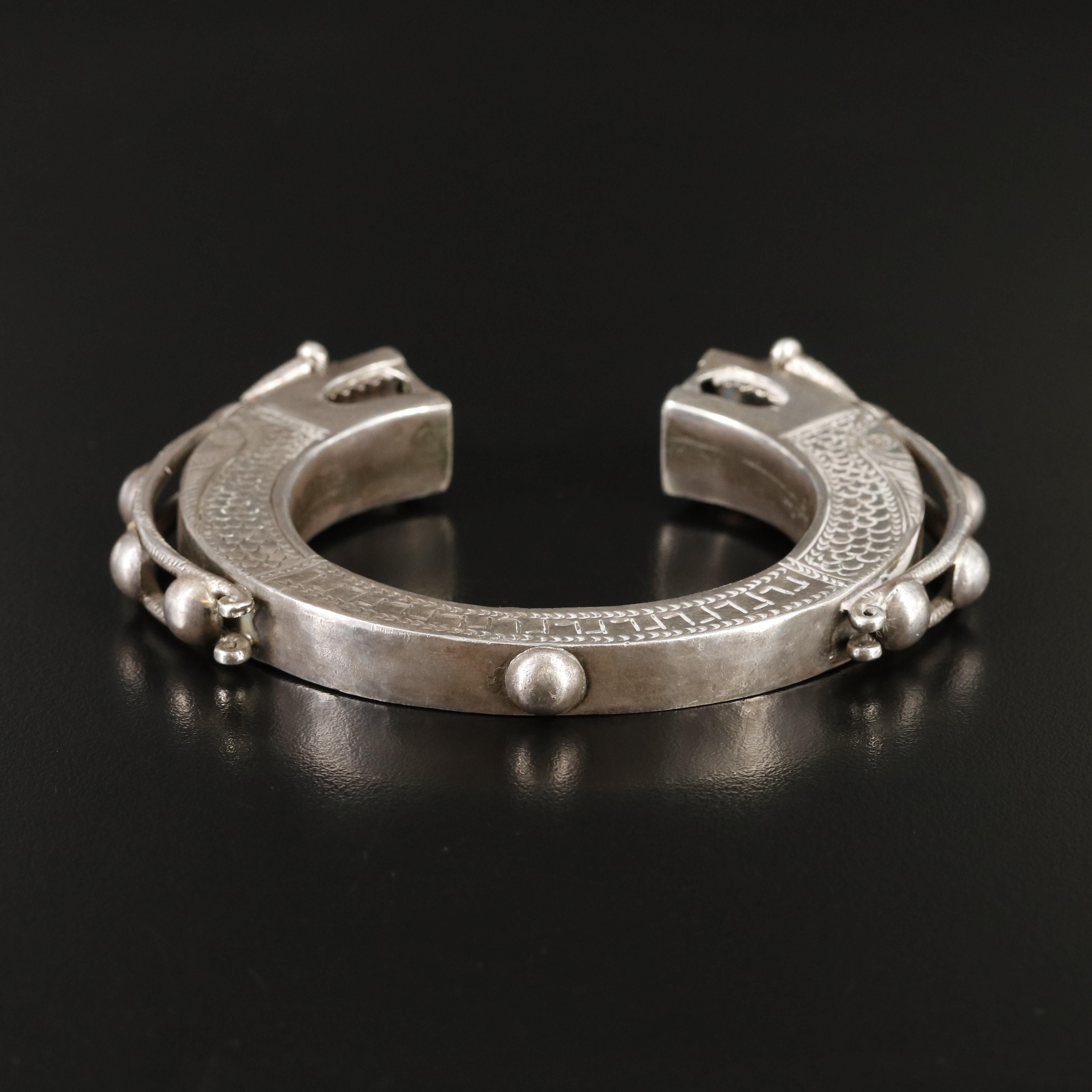 Vintage Laos Tai Lue Engraved Bangle with Dragon Terminals