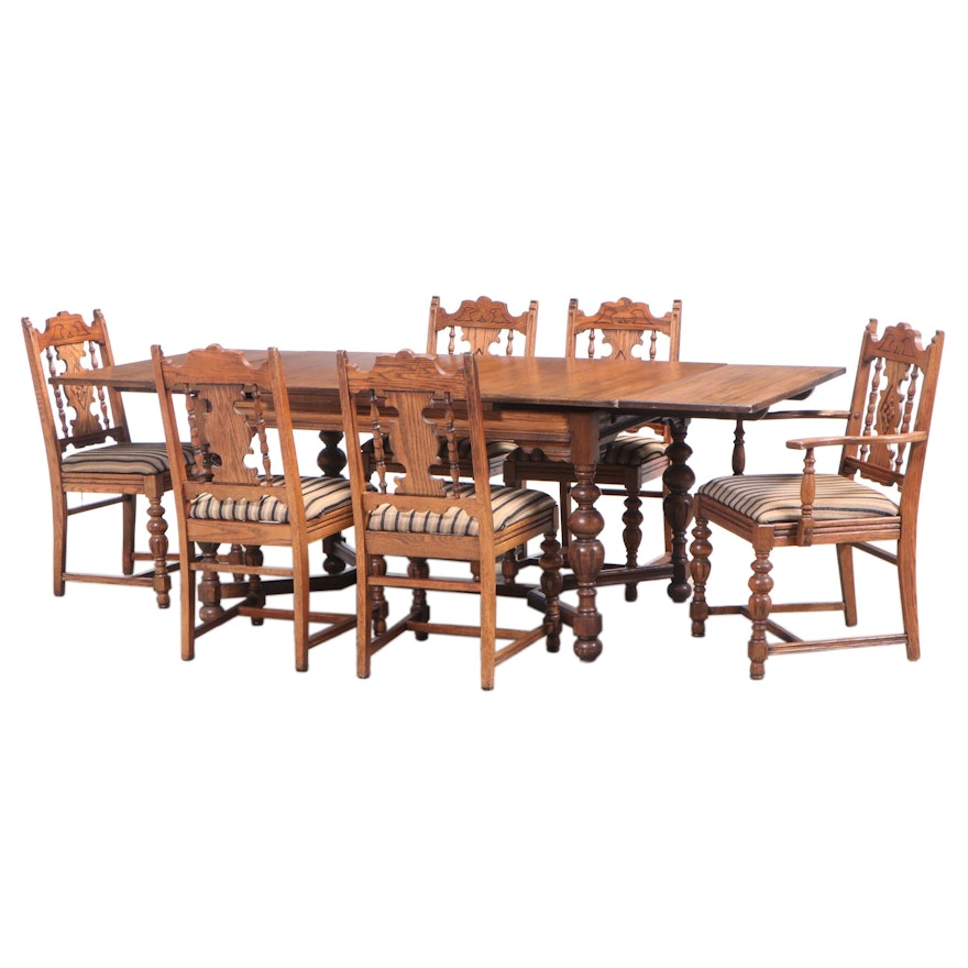 Seven-Piece Alms & Doepke Jacobean Revival Oak Dining Set, circa 1930