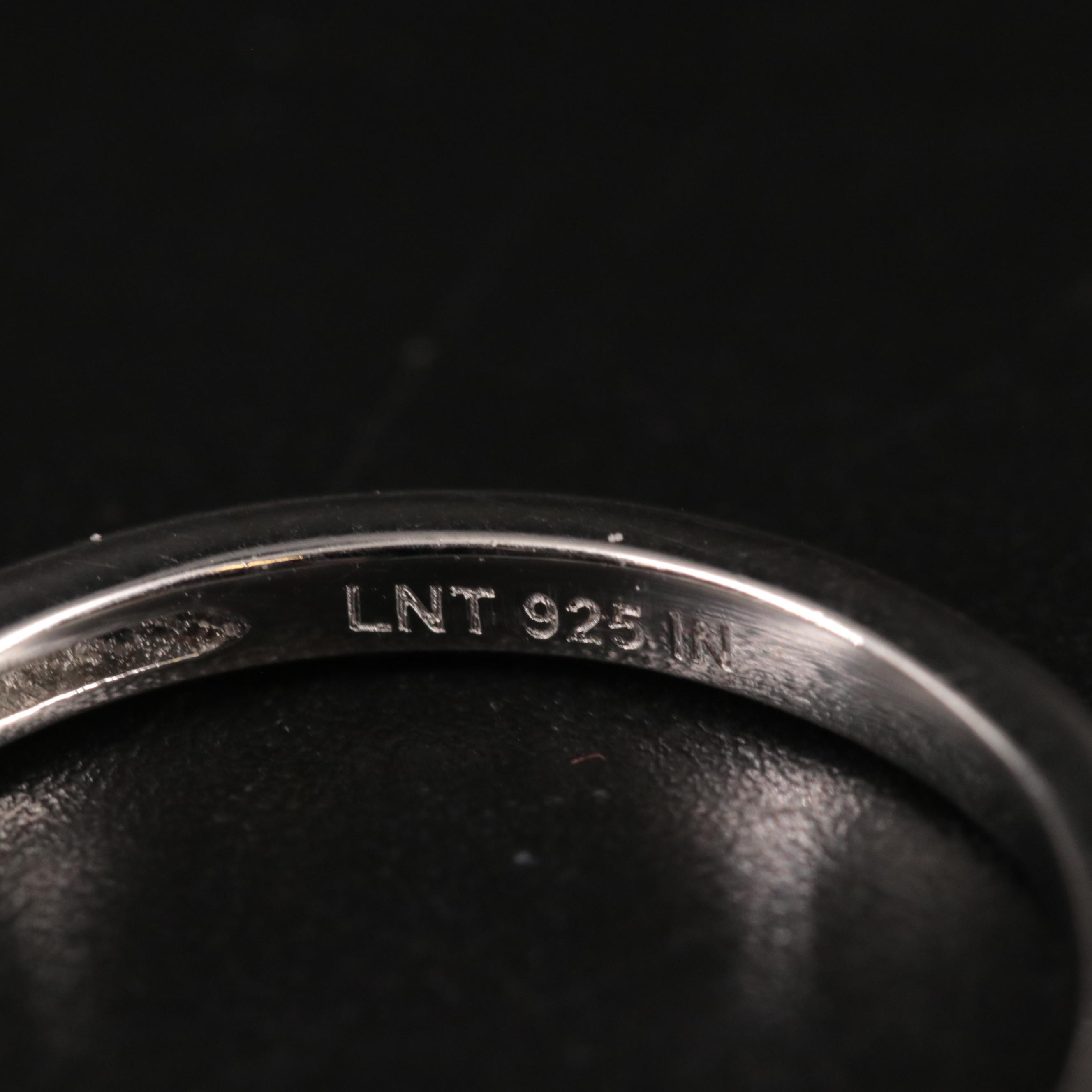 Sterling Silver Topaz and Cubic Zirconia Ring