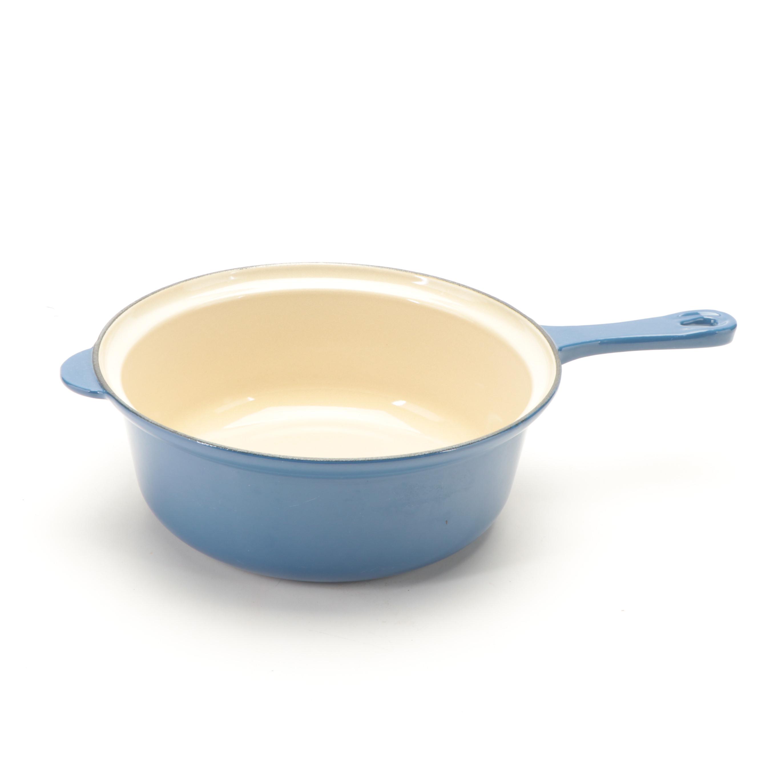 Le Creuset Dark Blue Enameled Cast Iron Pans and Trivets