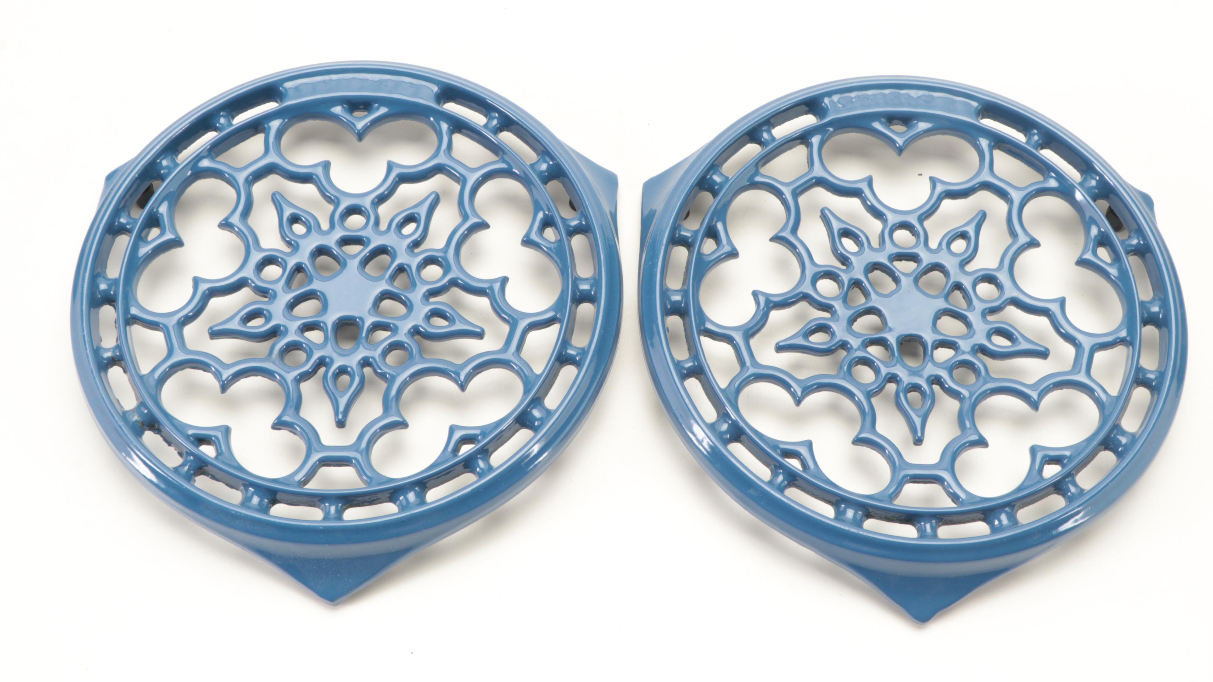 Le Creuset Dark Blue Enameled Cast Iron Pans and Trivets