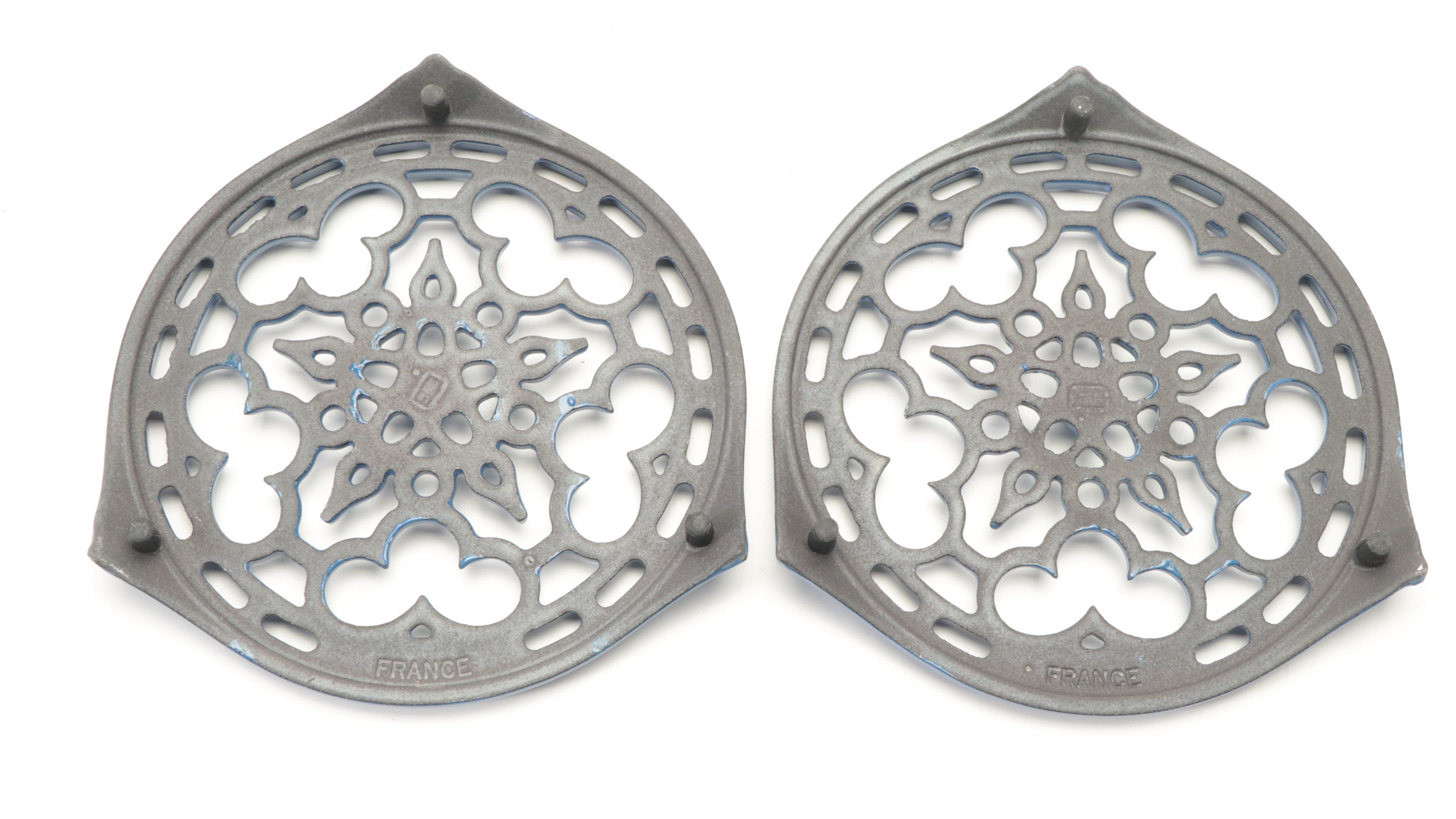 Le Creuset Dark Blue Enameled Cast Iron Pans and Trivets