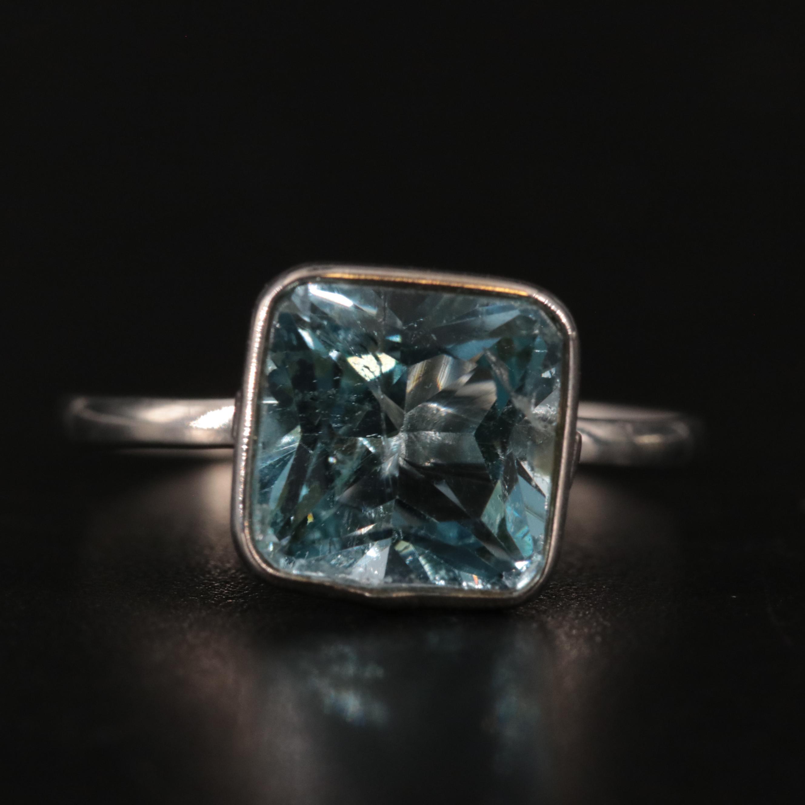 14K Blue Topaz Ring