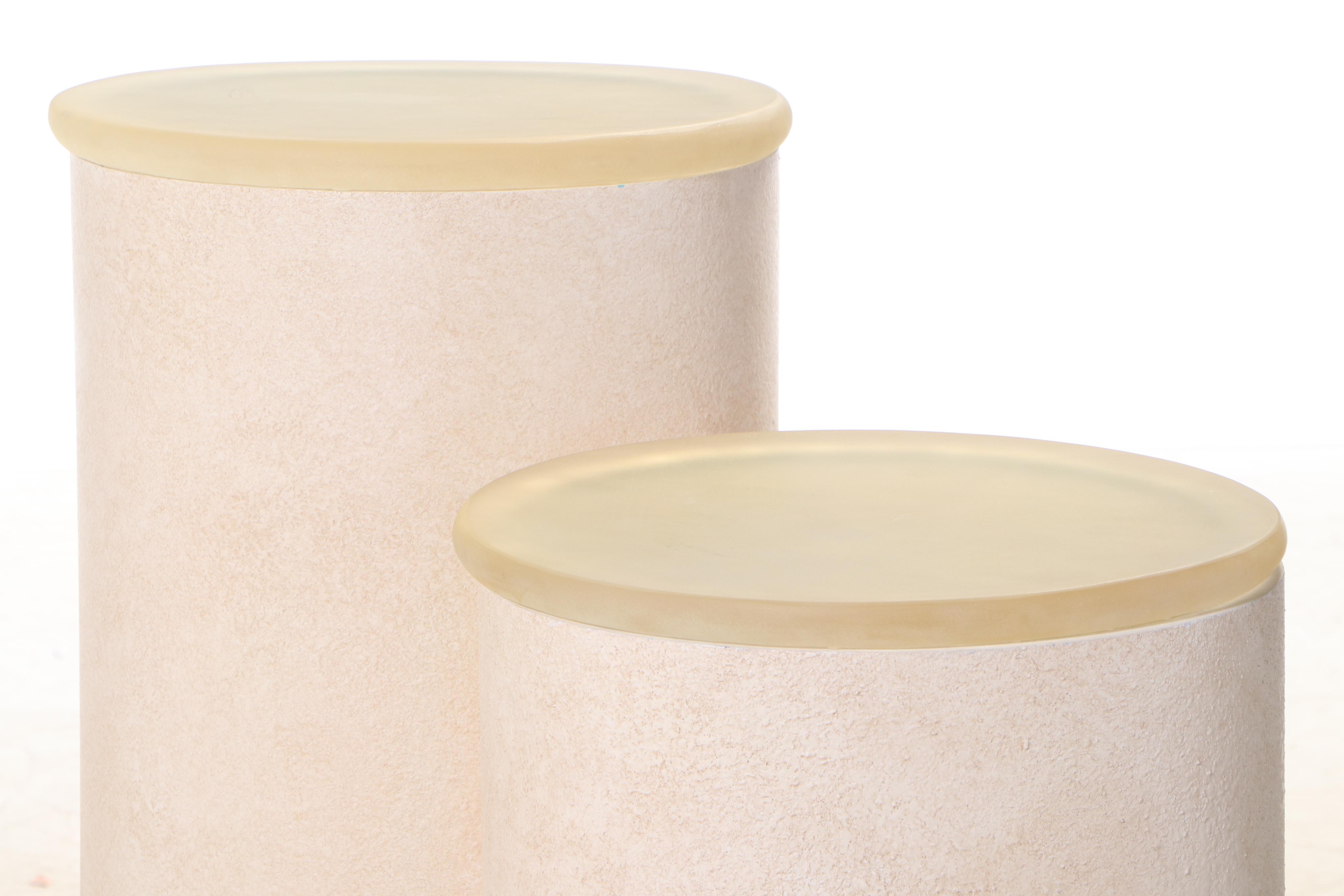 Two Painted Composite and Illuminated Graduated Display Pedestals