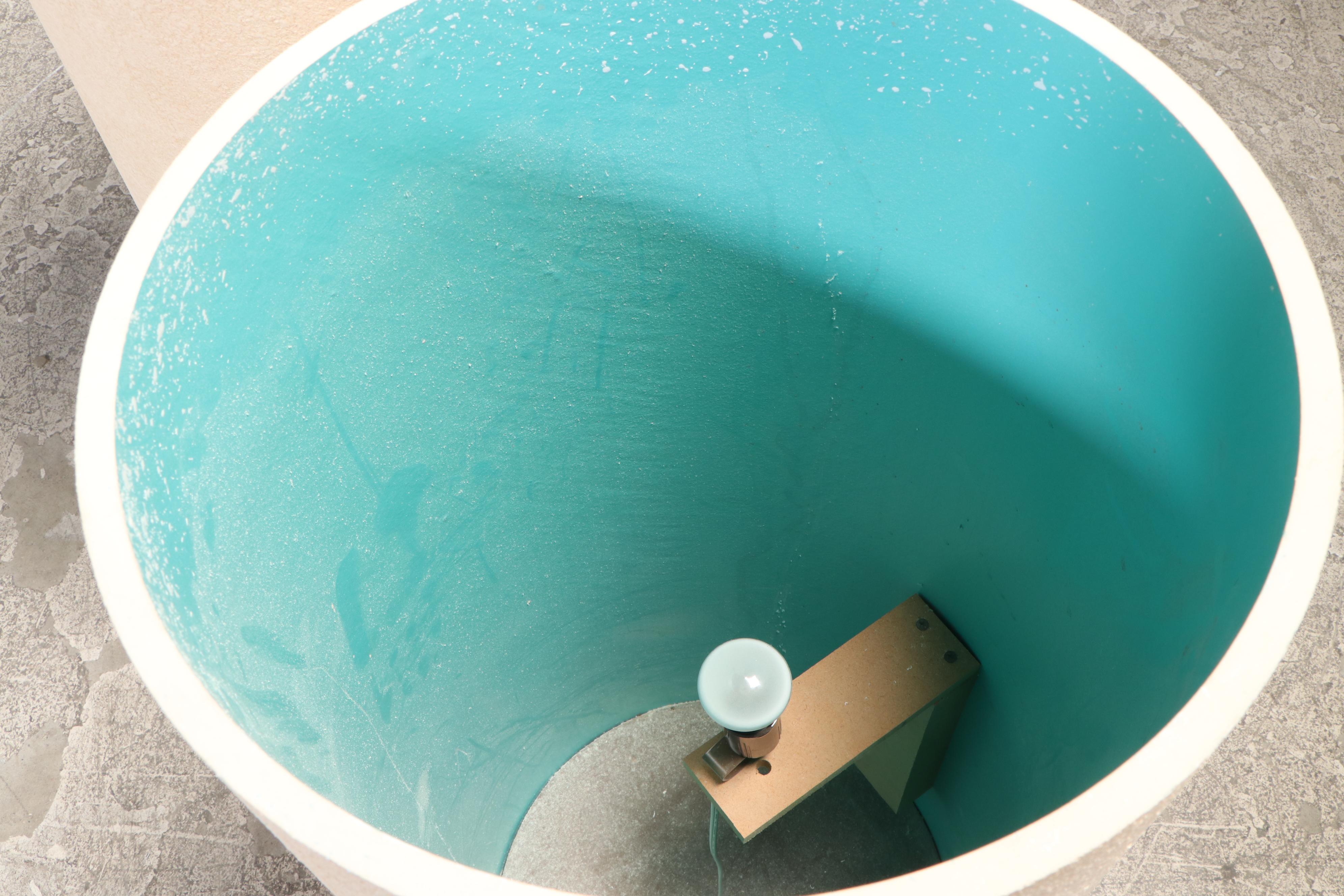 Two Painted Composite and Illuminated Graduated Display Pedestals