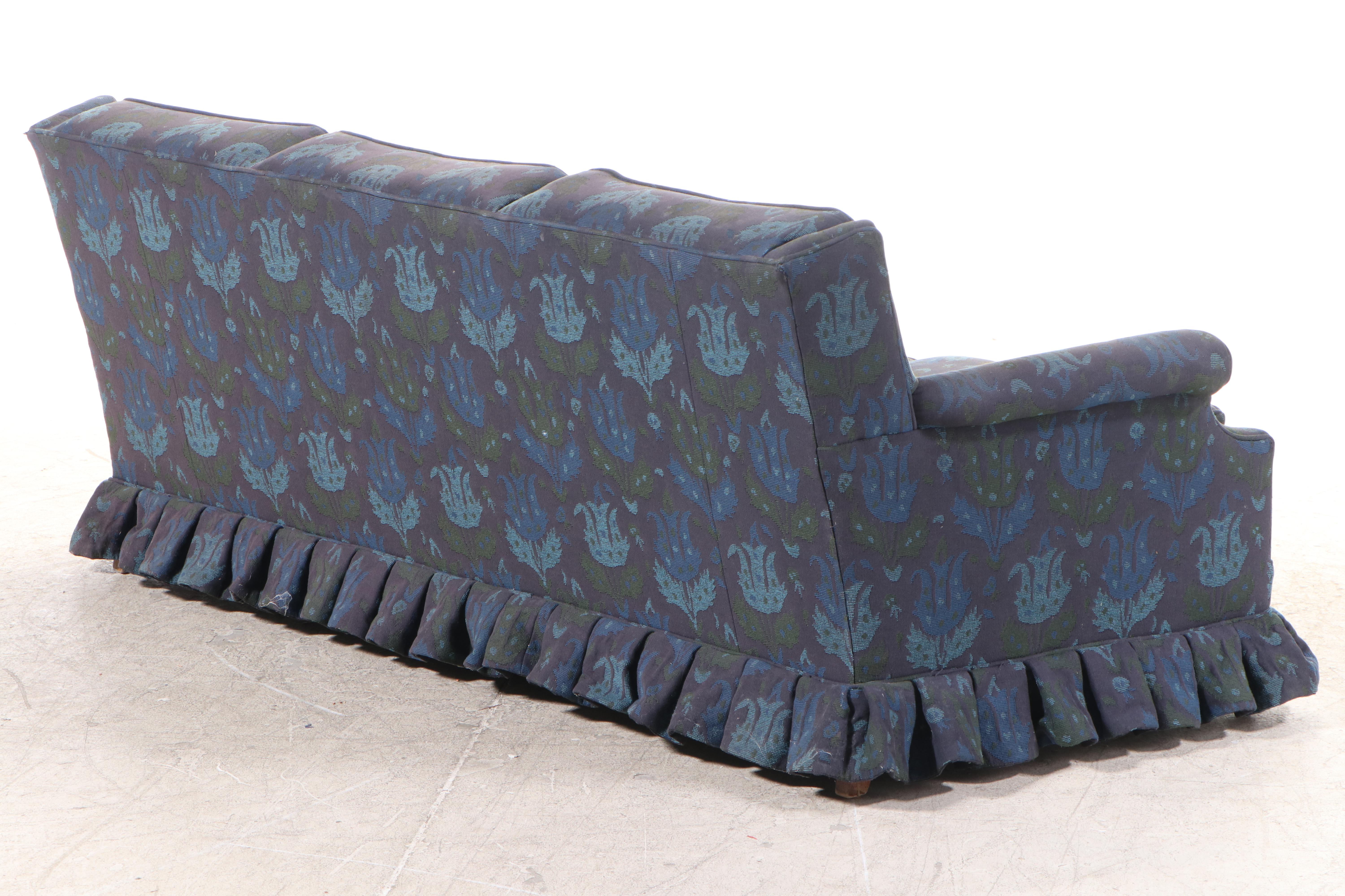Winged Sofa with Ruffled Skirt