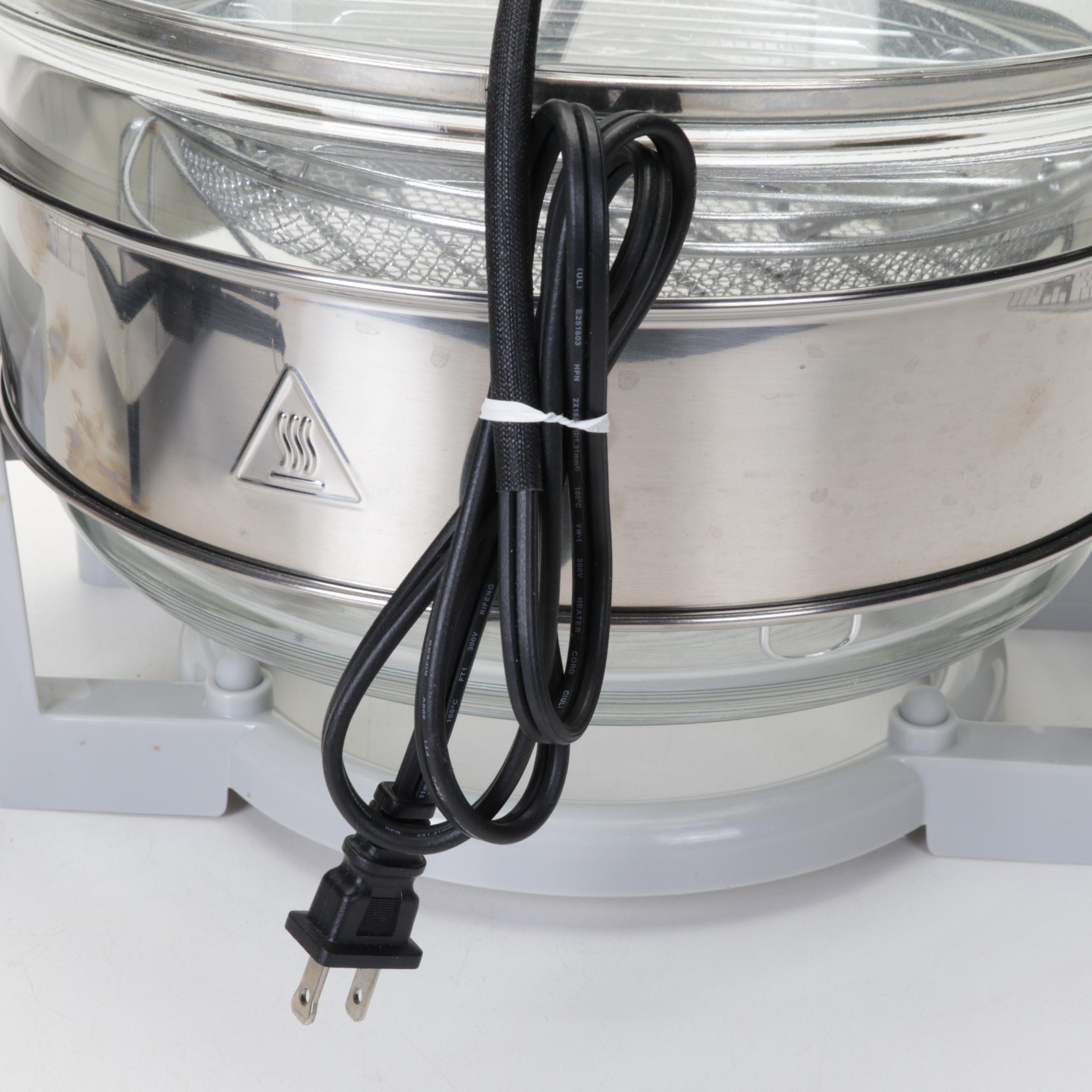 Big Boss Air Fryer, Presto Rice Cooker, and Rival Waffle Iron