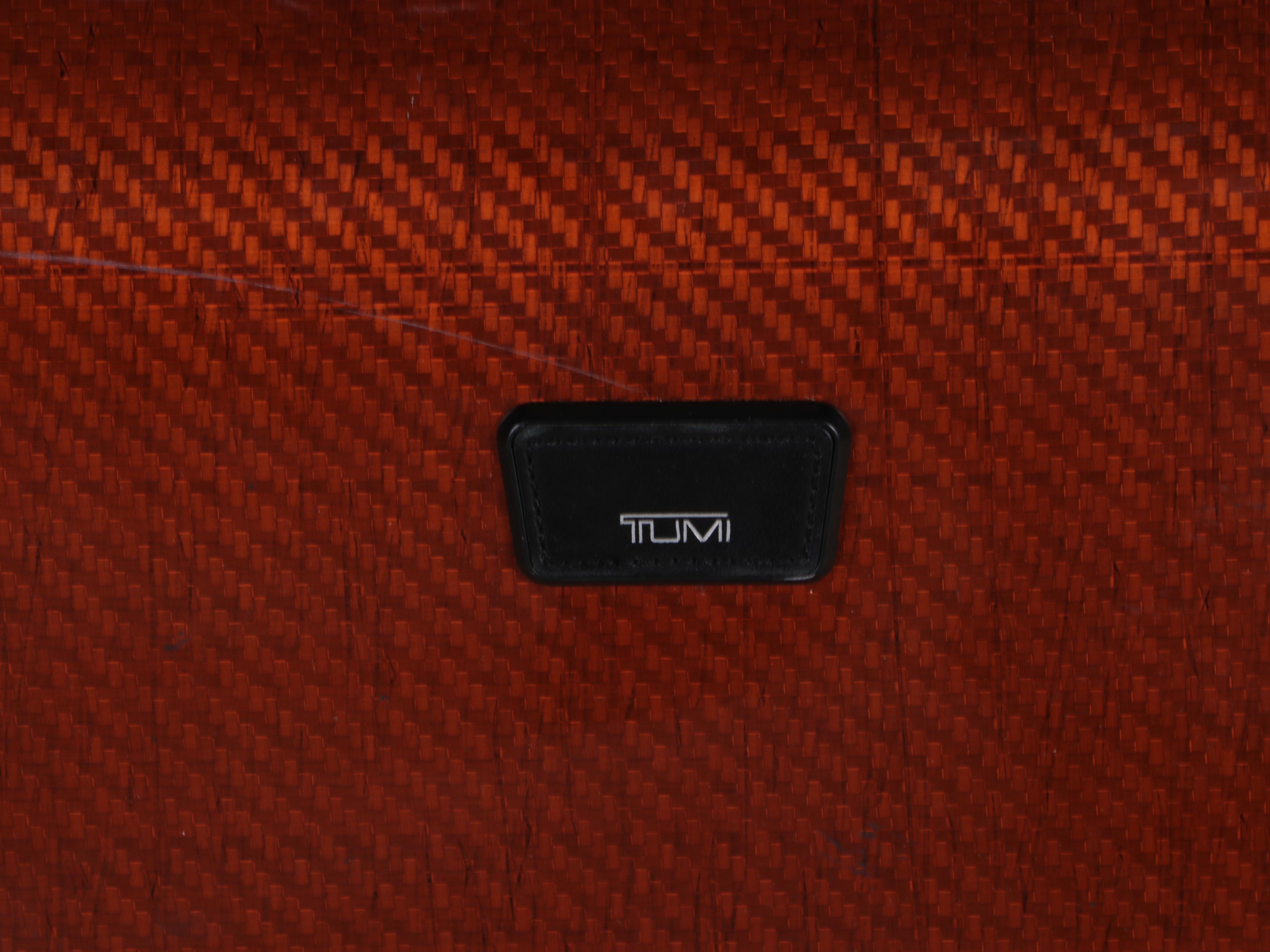 Tumi Tegris® Lightweight Hard Shell 4-Wheel Luggage Case with Telescoping Handle