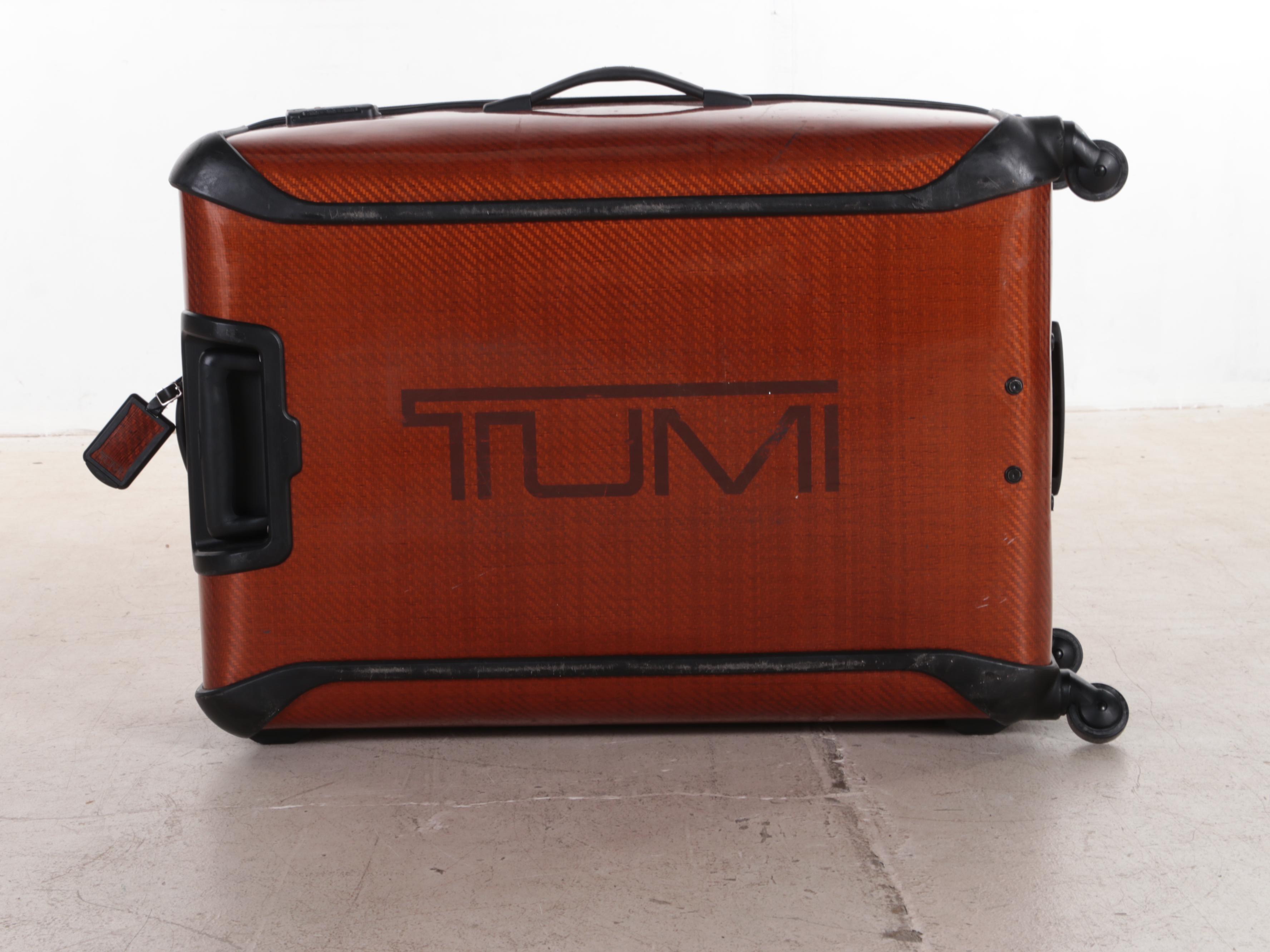 Tumi Tegris® Lightweight Hard Shell 4-Wheel Luggage Case with Telescoping Handle