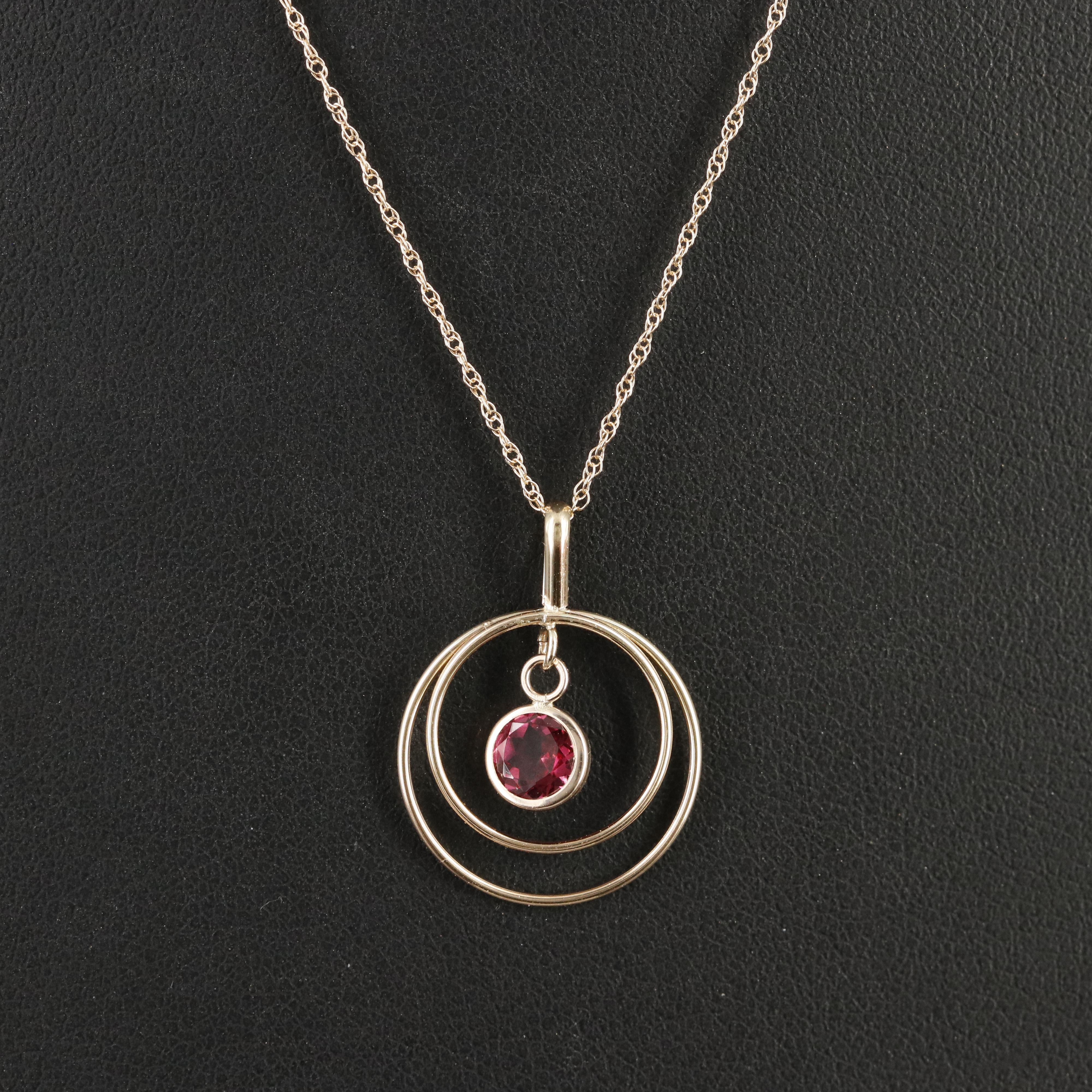 14K Garnet Open Circle Pendant Necklace