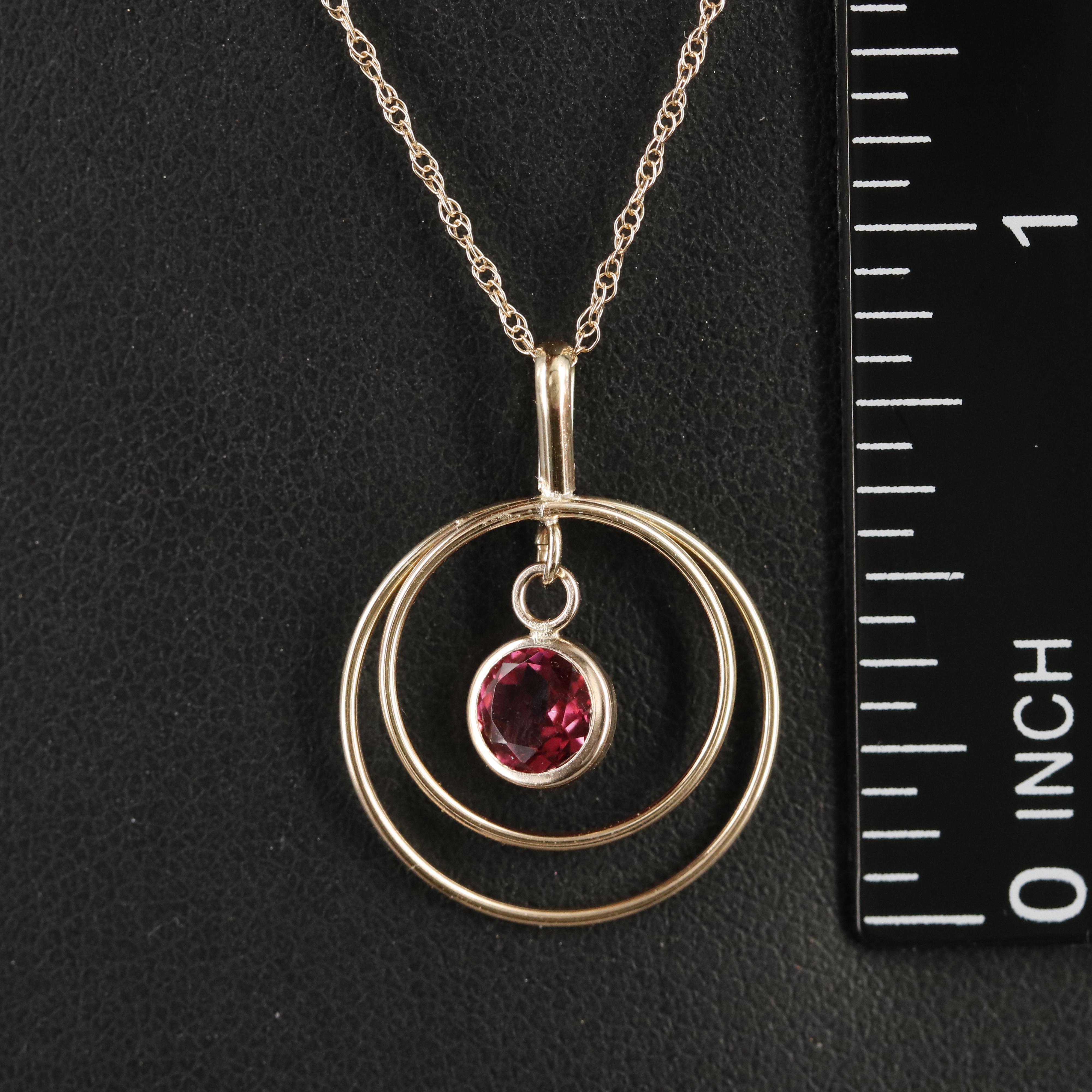 14K Garnet Open Circle Pendant Necklace