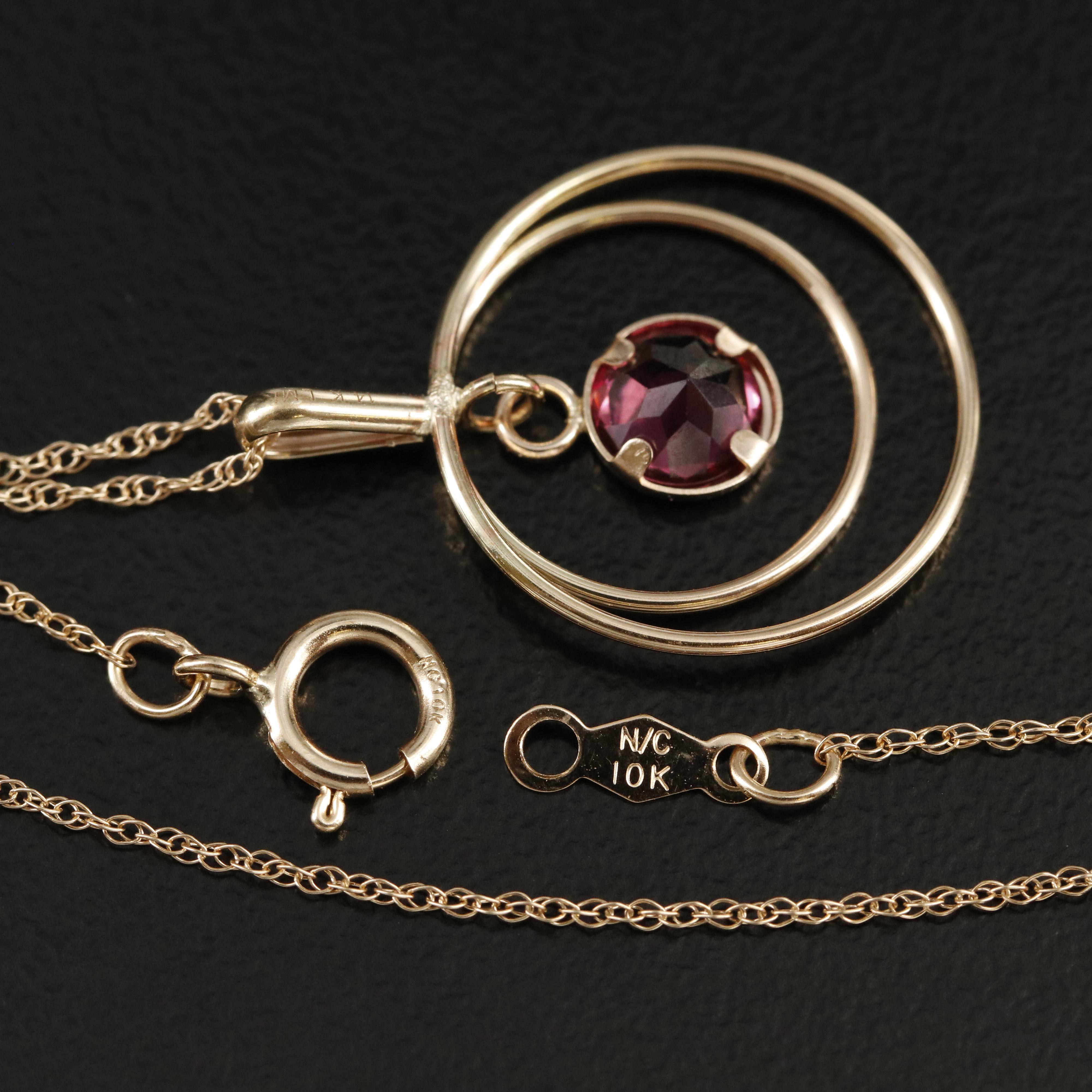 14K Garnet Open Circle Pendant Necklace