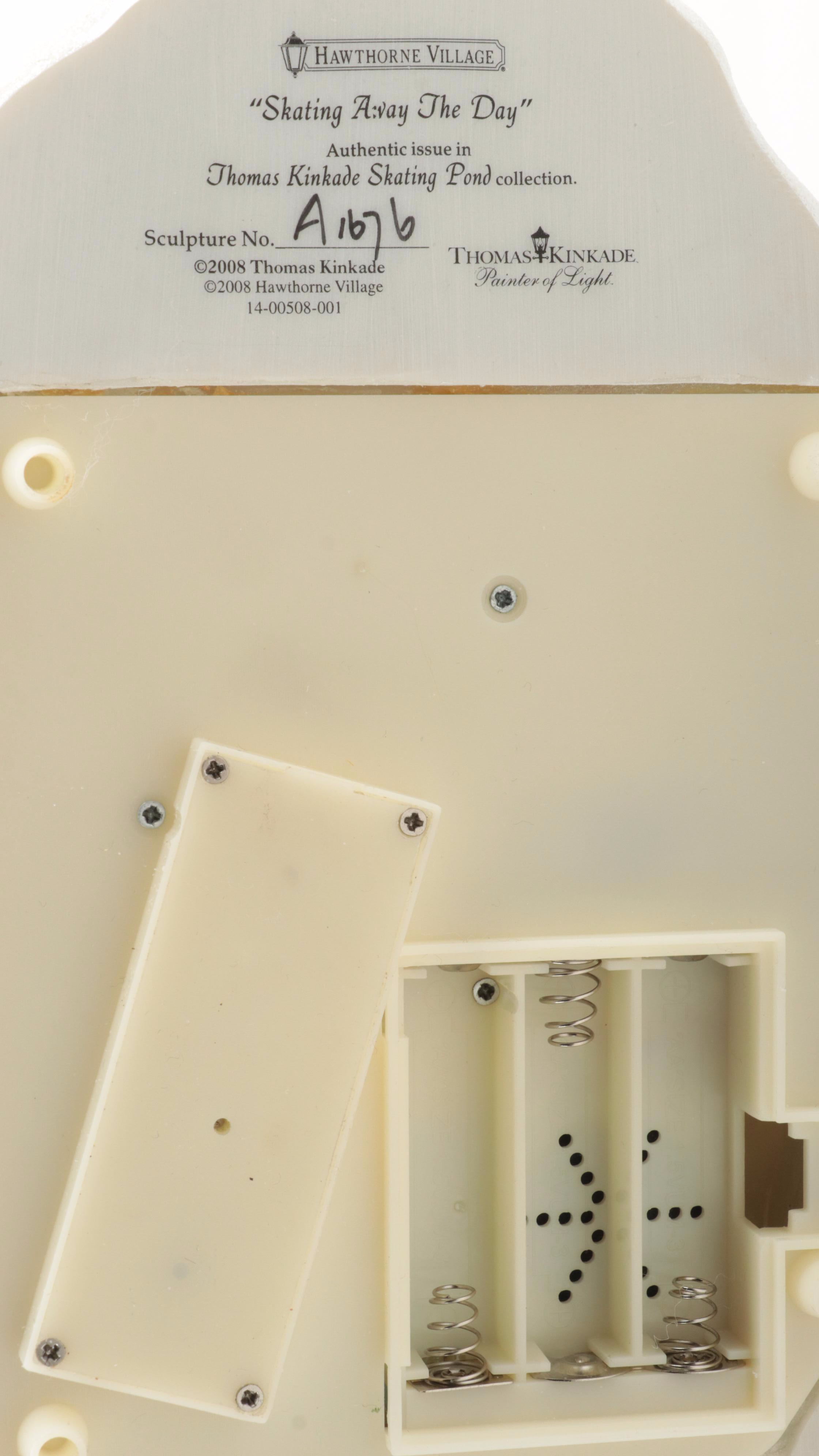 Thomas Kinkaide and Other Illuminated Christmas Village Houses and Ponds