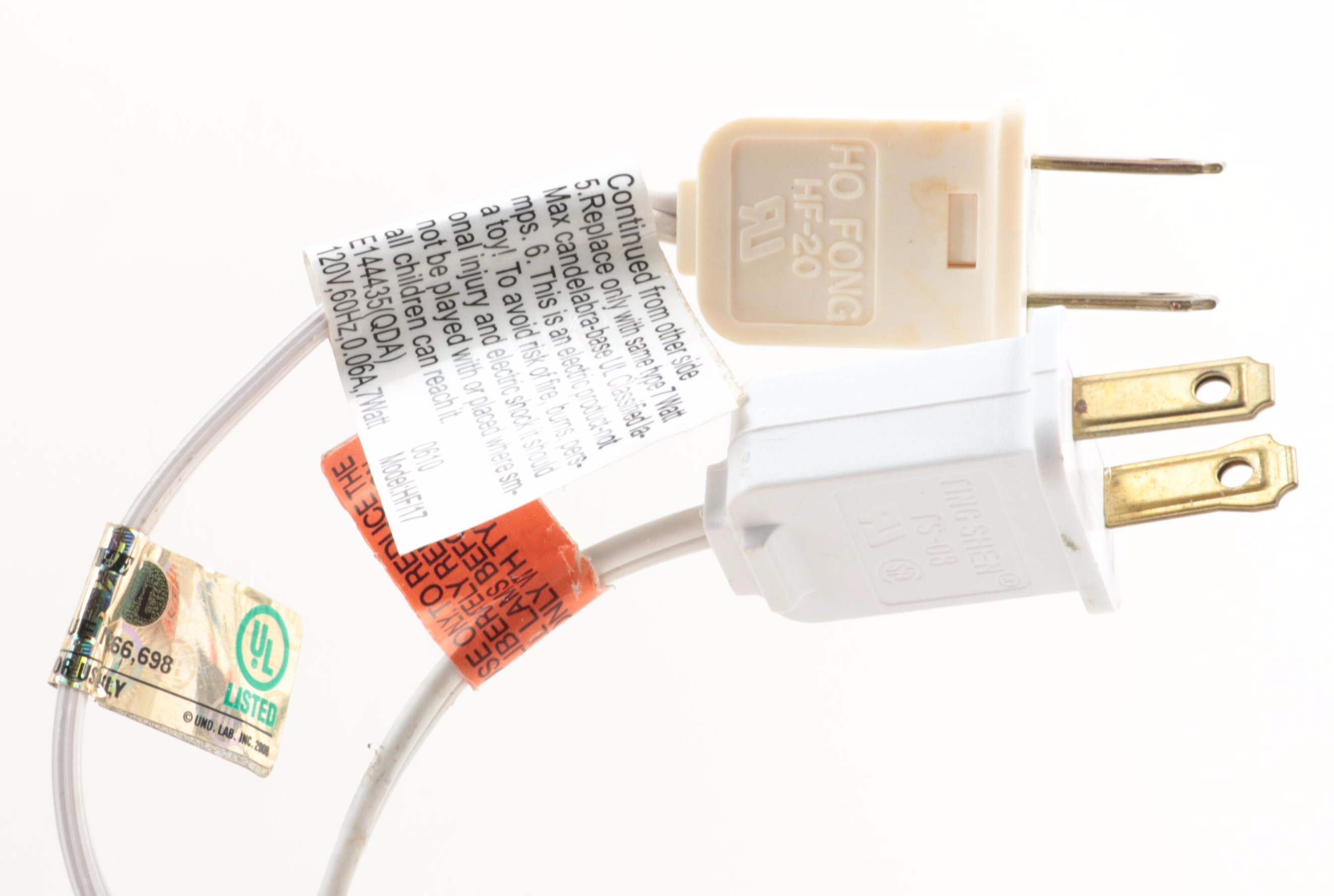 Thomas Kinkaide and Other Illuminated Christmas Village Houses and Ponds