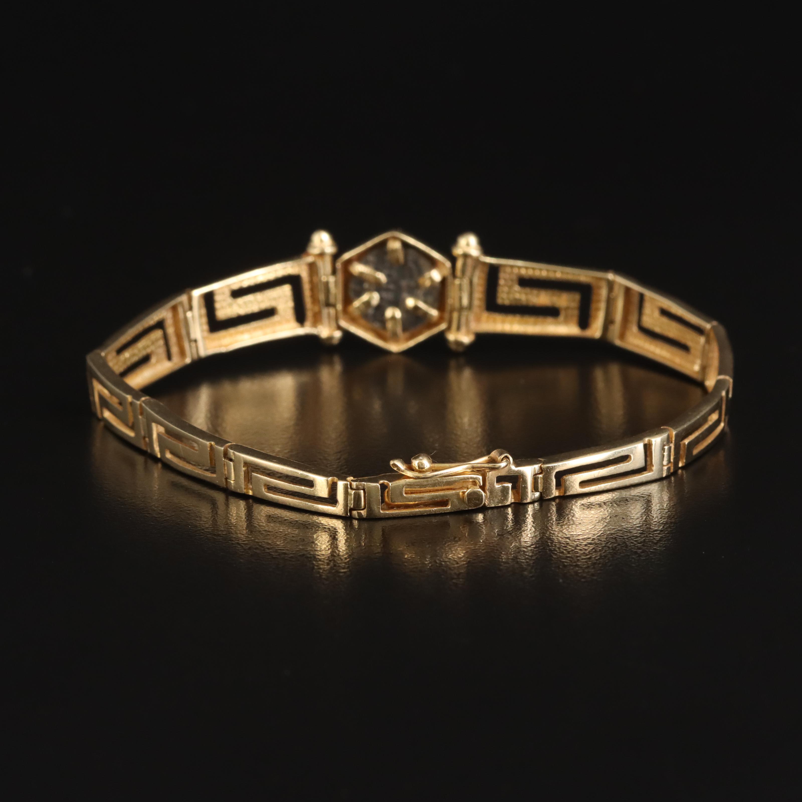 14K Graduated Greek Key Link Bracelet Holding Reproduction Ancient Greek Coin