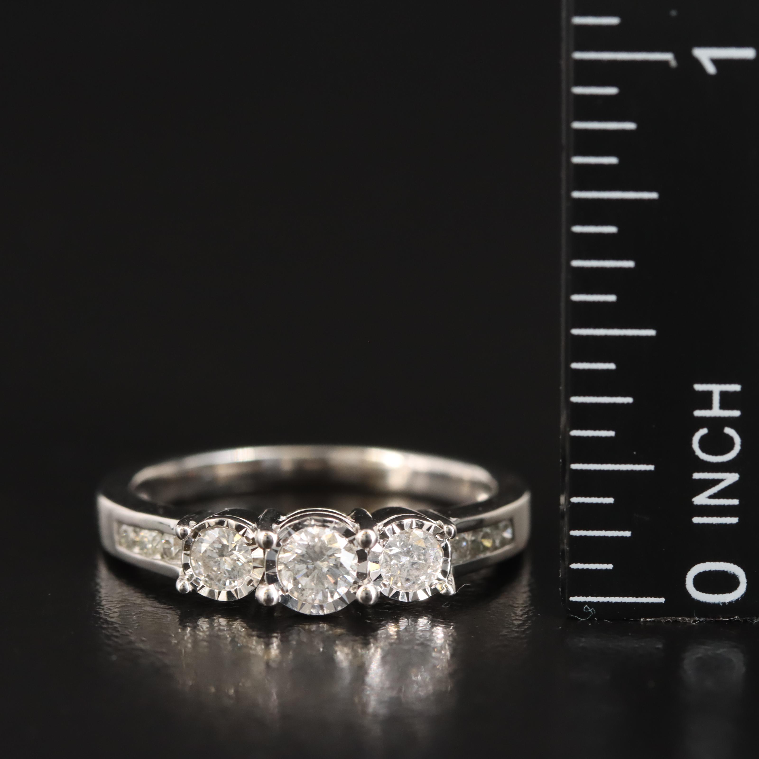 10K 0.29 CTW Diamond Three Stone Ring