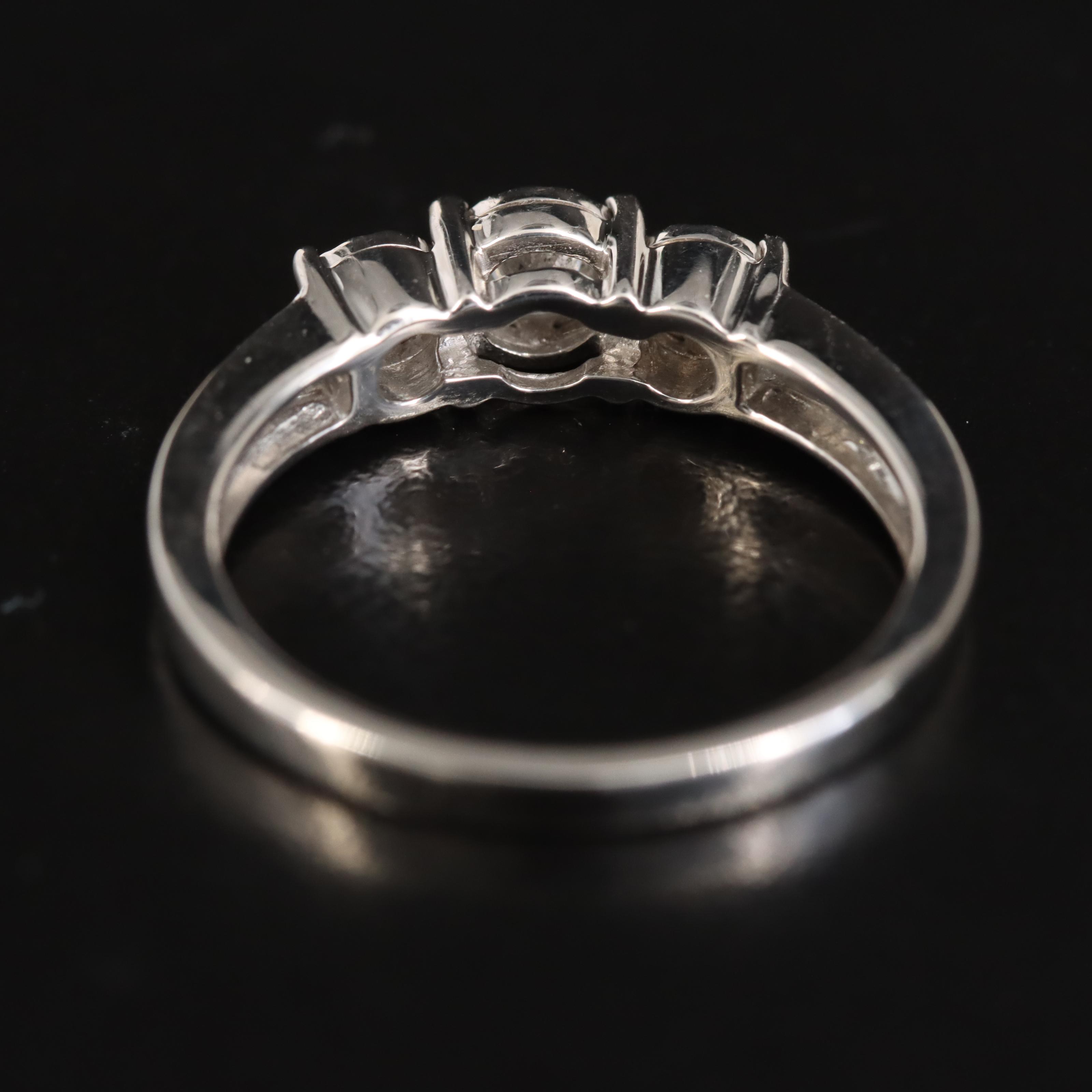 10K 0.29 CTW Diamond Three Stone Ring