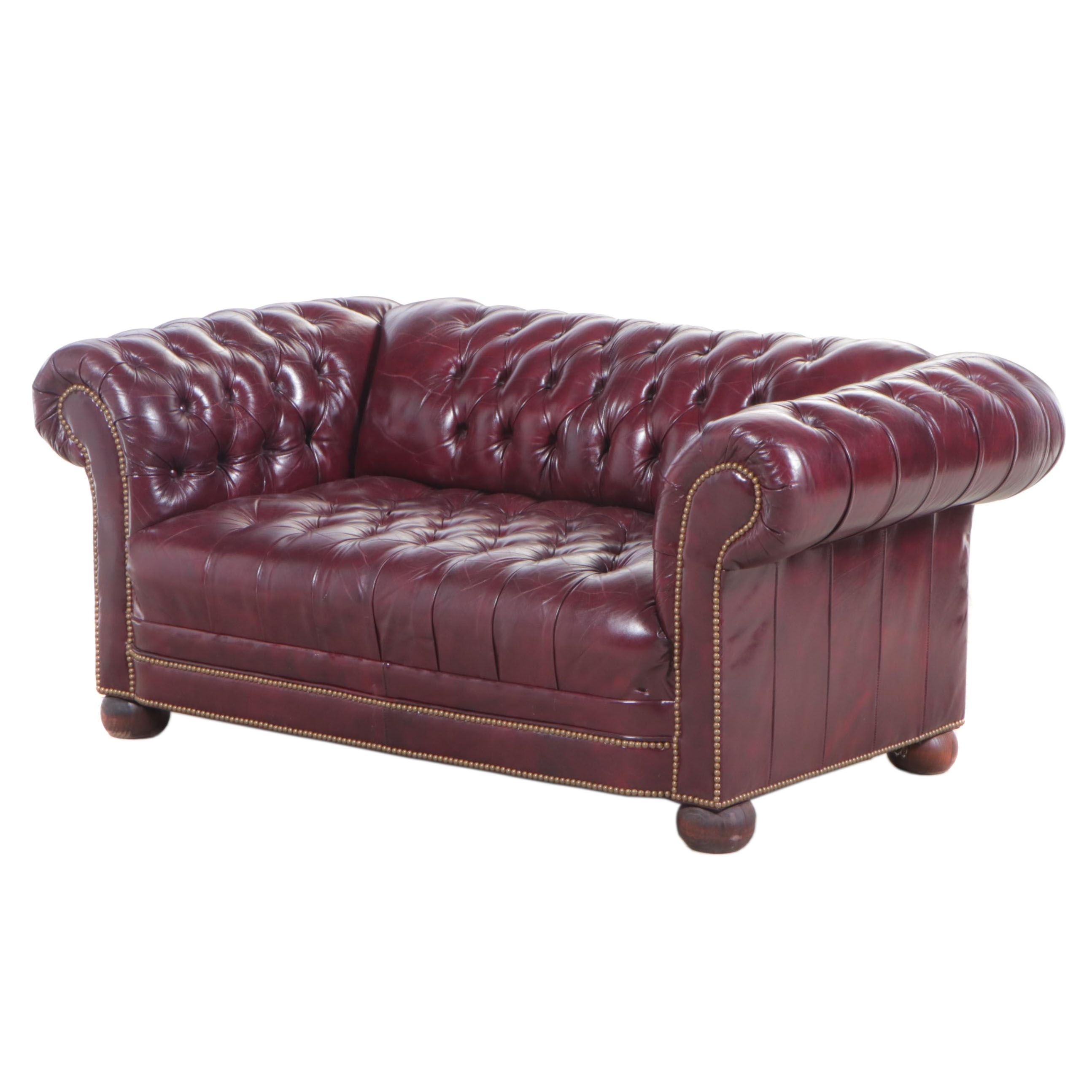 Janess Furniture Burgundy Leather Chesterfield Loveseat with Nailhead Trim