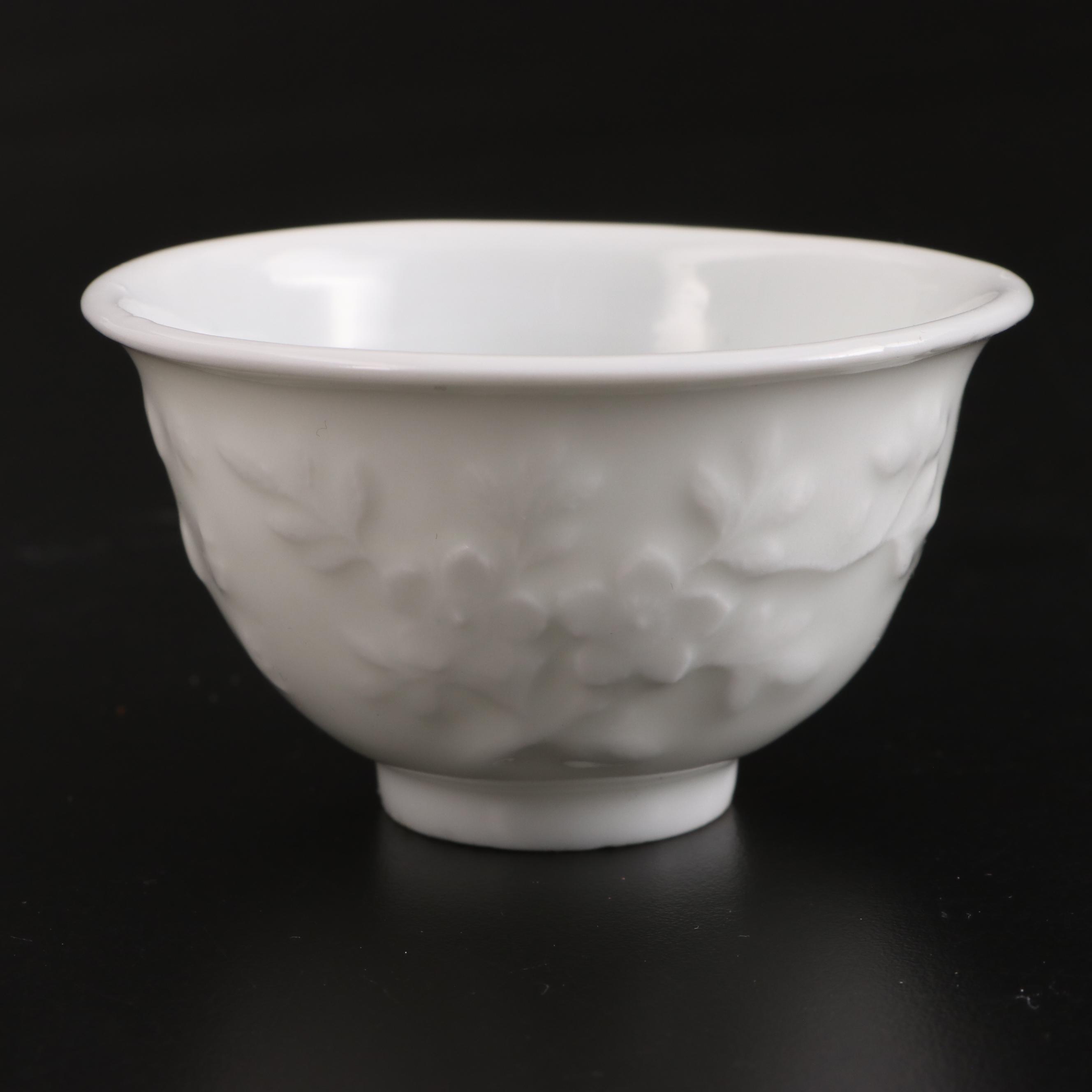 Pair of Chinese Embossed Porcelain Tea Bowls