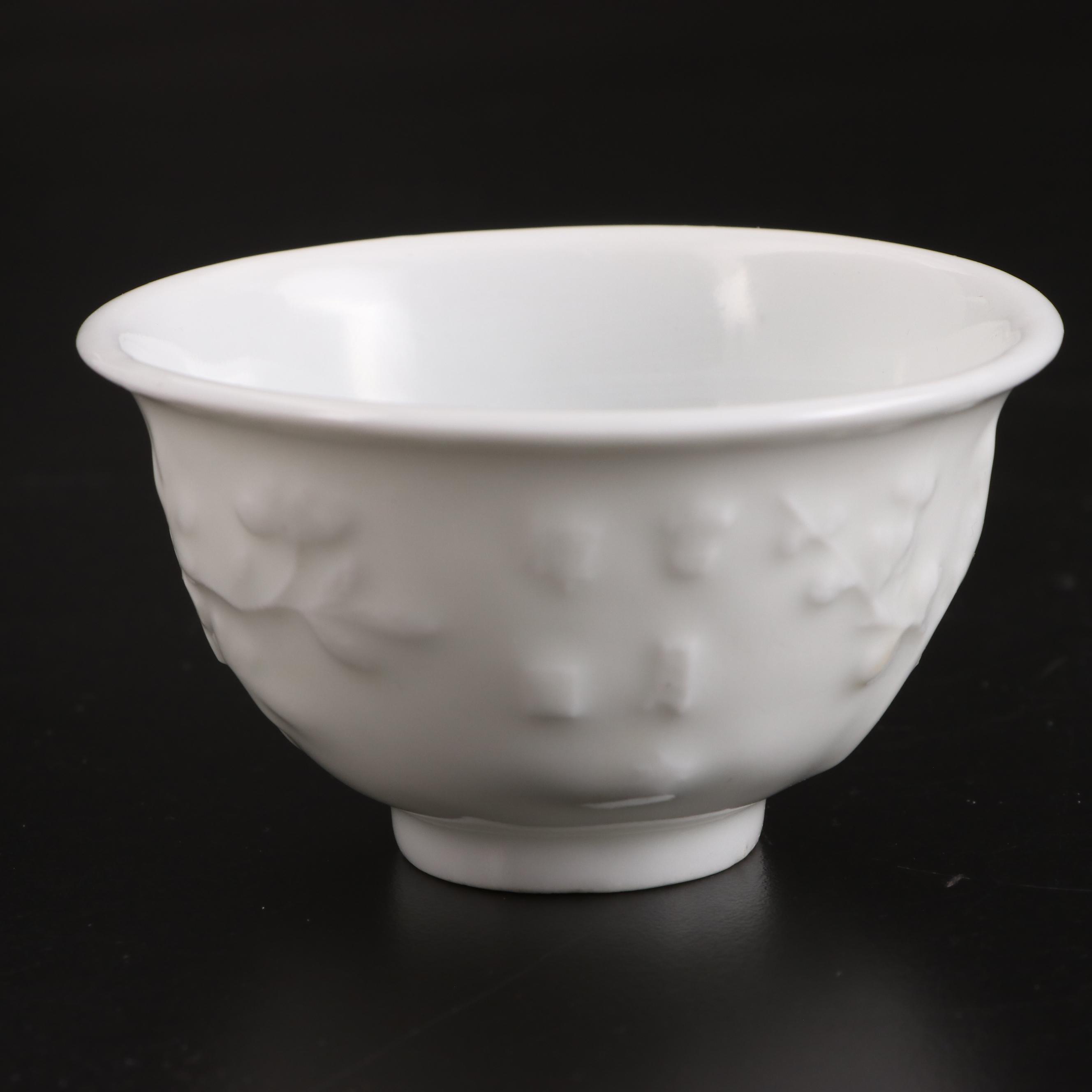 Pair of Chinese Embossed Porcelain Tea Bowls