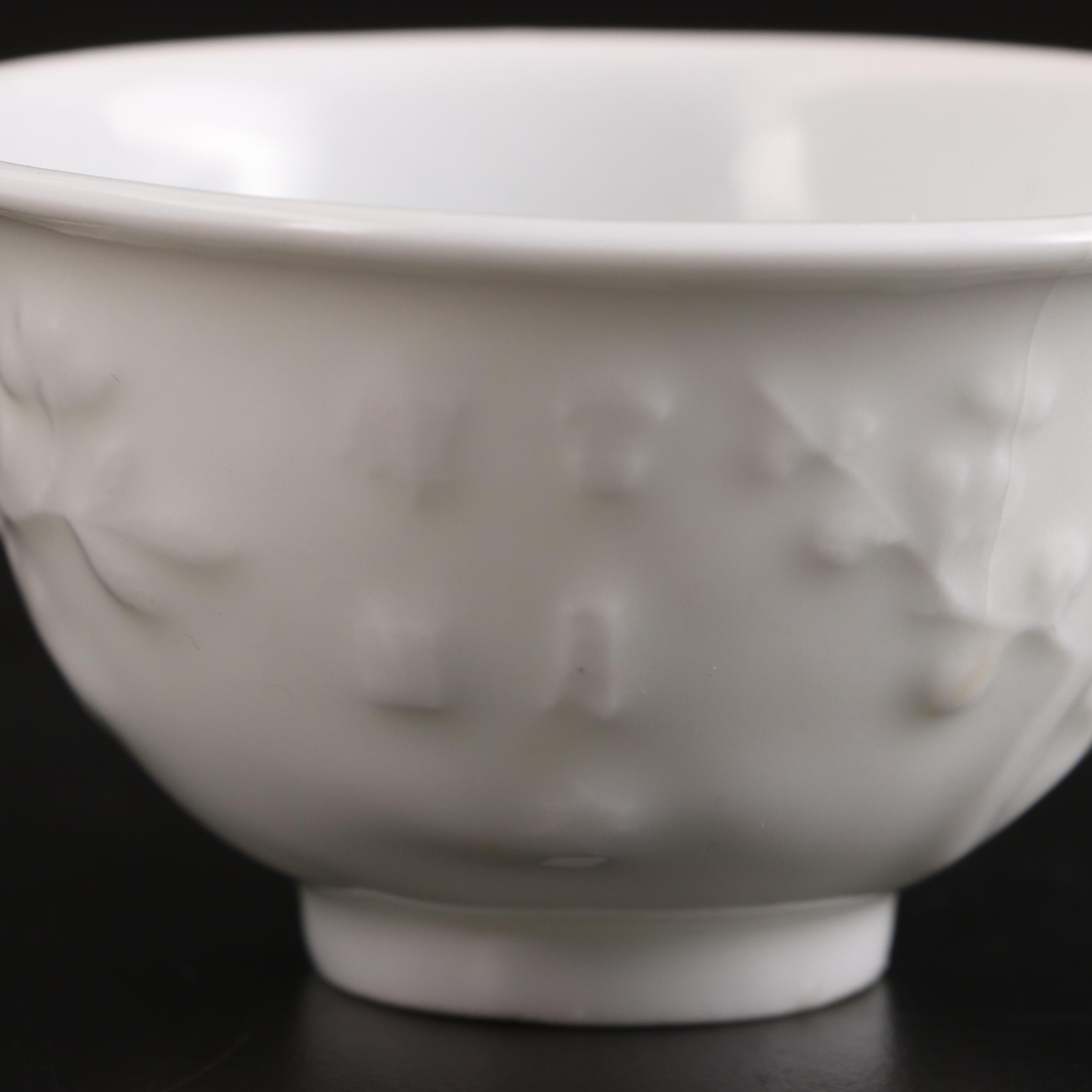 Pair of Chinese Embossed Porcelain Tea Bowls