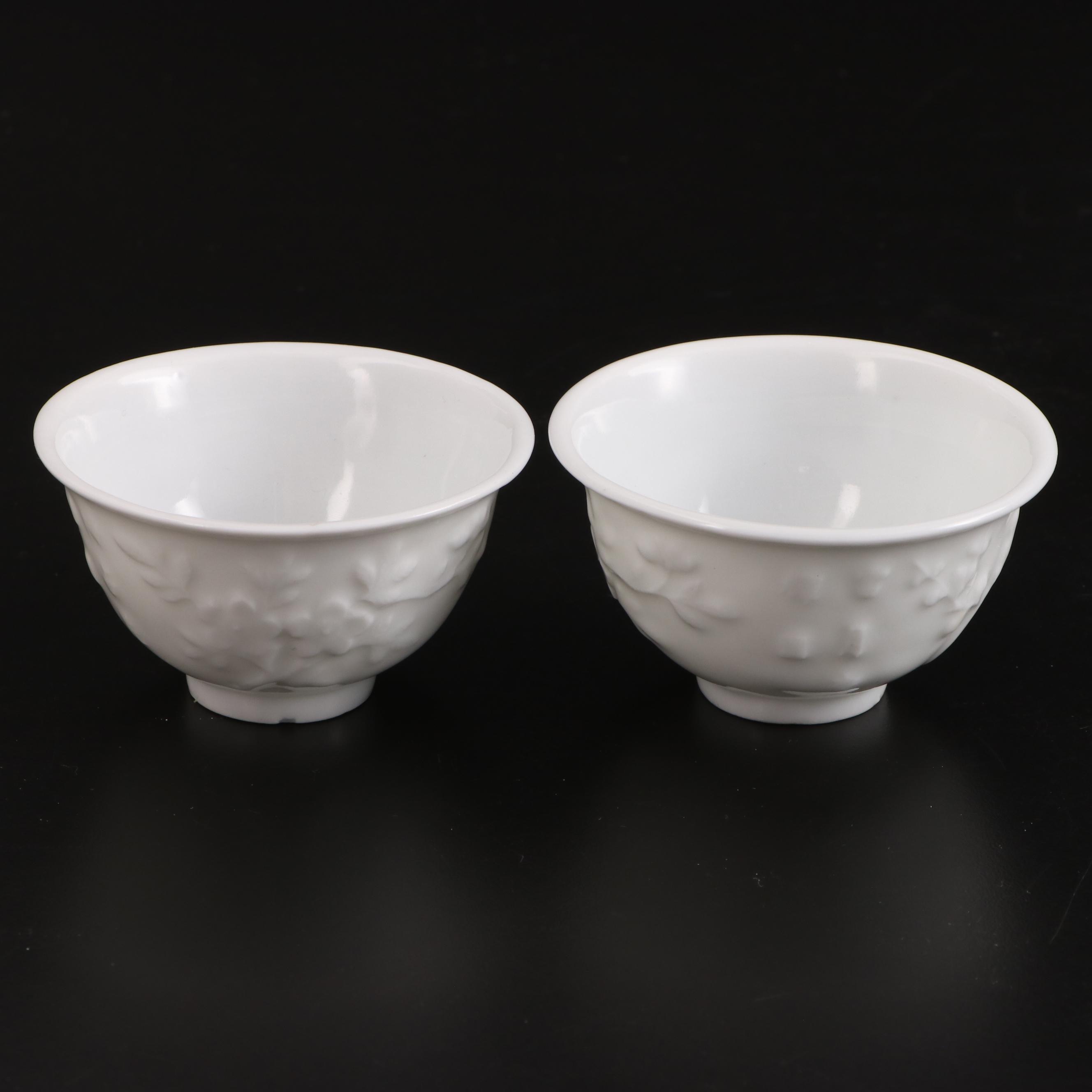 Pair of Chinese Embossed Porcelain Tea Bowls