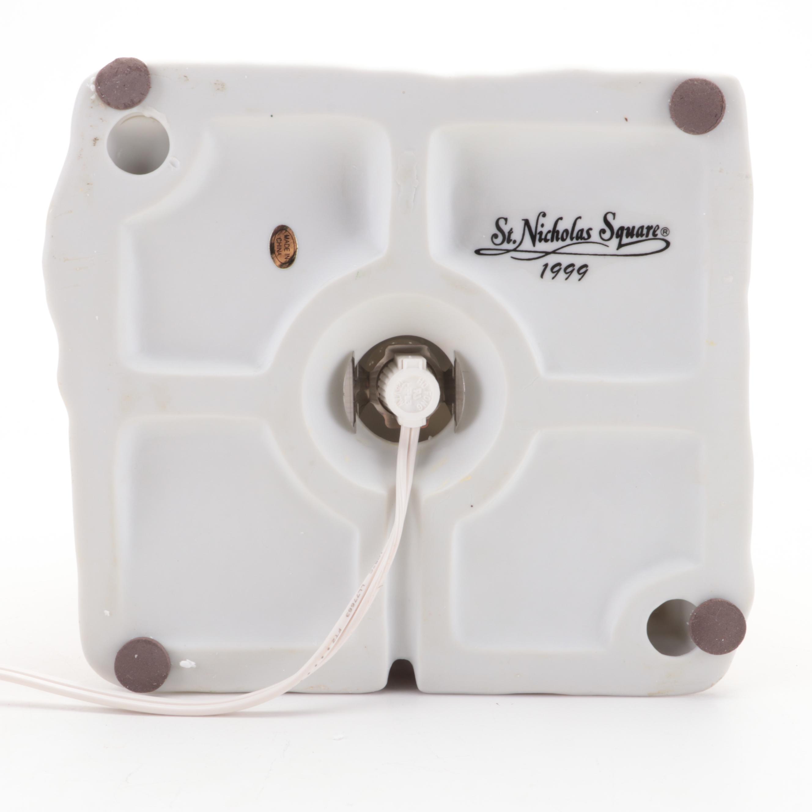 St. Nicholas Square "Holiday Square" Ceramic Illuminated Building and Carolers