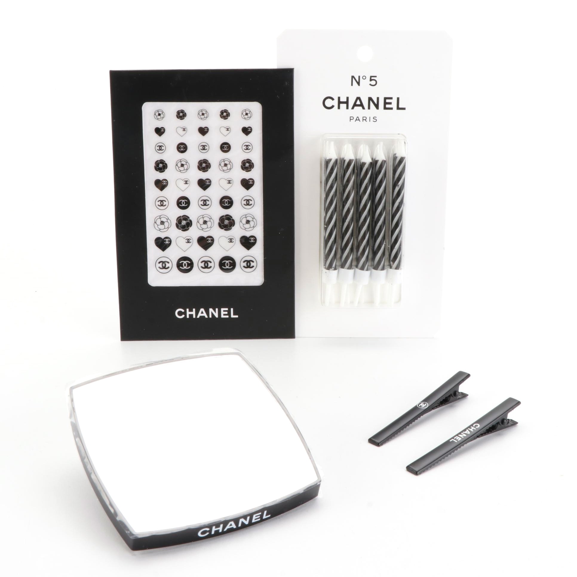 Chanel Beauté Promotional Pocket Mirror, Hair Clips, Nail Stickers, and Candles