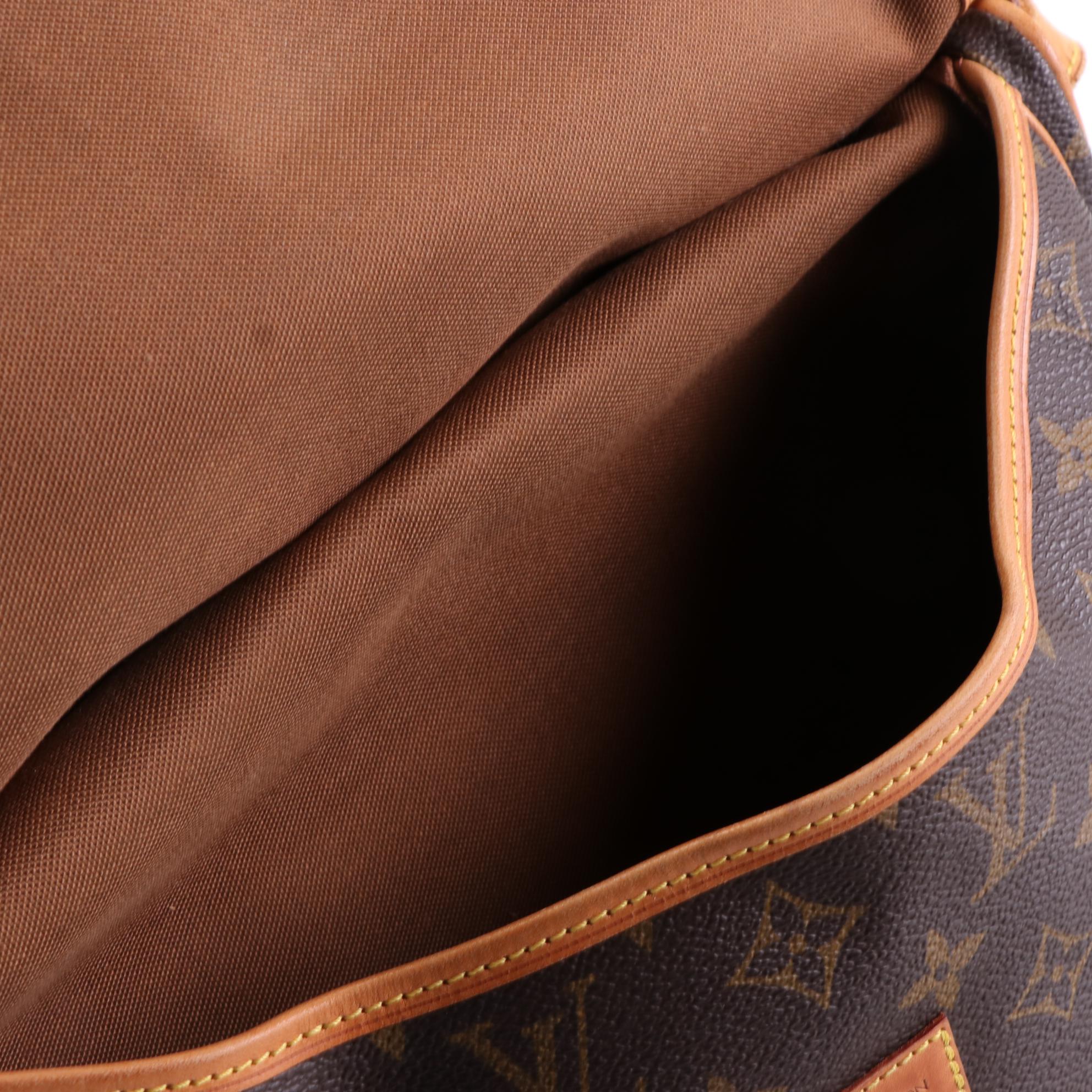 Louis Vuitton Saumur 30 in Monogram Canvas and Vachetta Leather