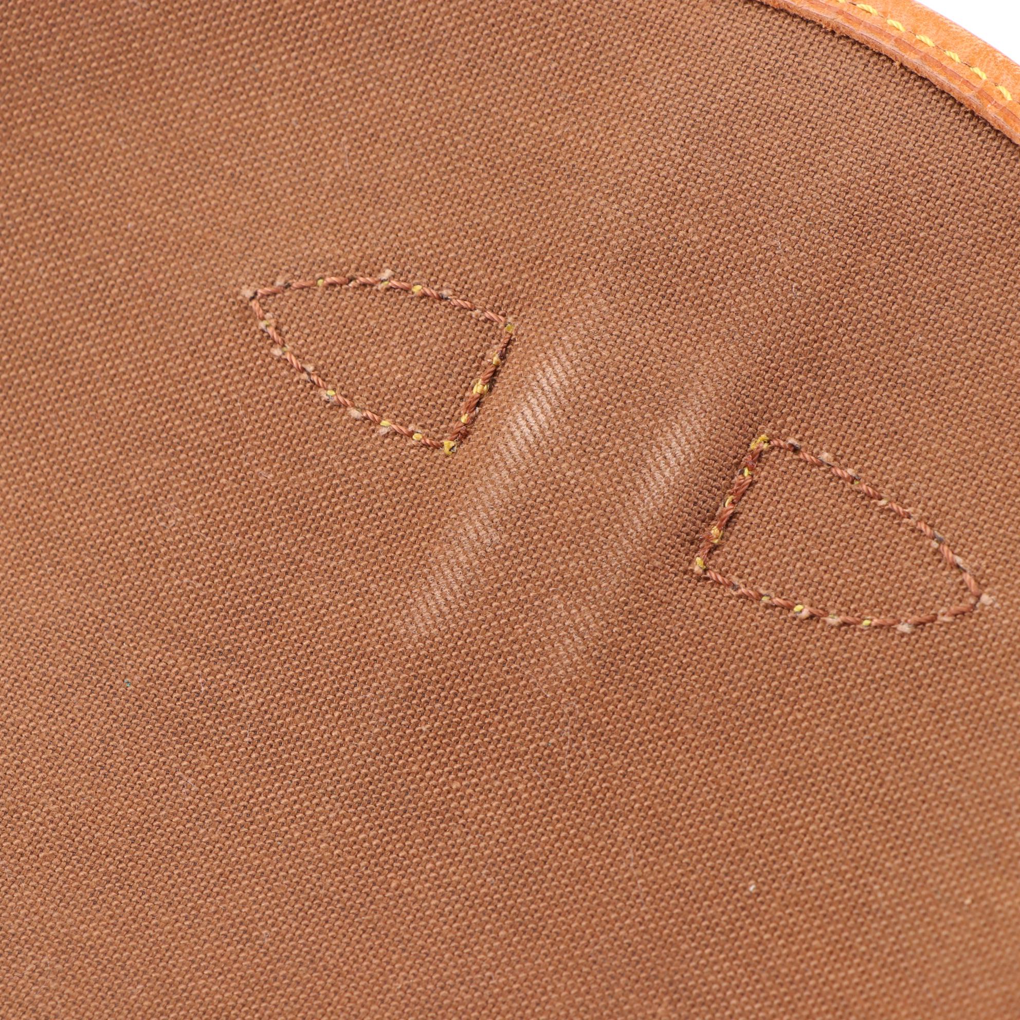 Louis Vuitton Saumur 30 in Monogram Canvas and Vachetta Leather