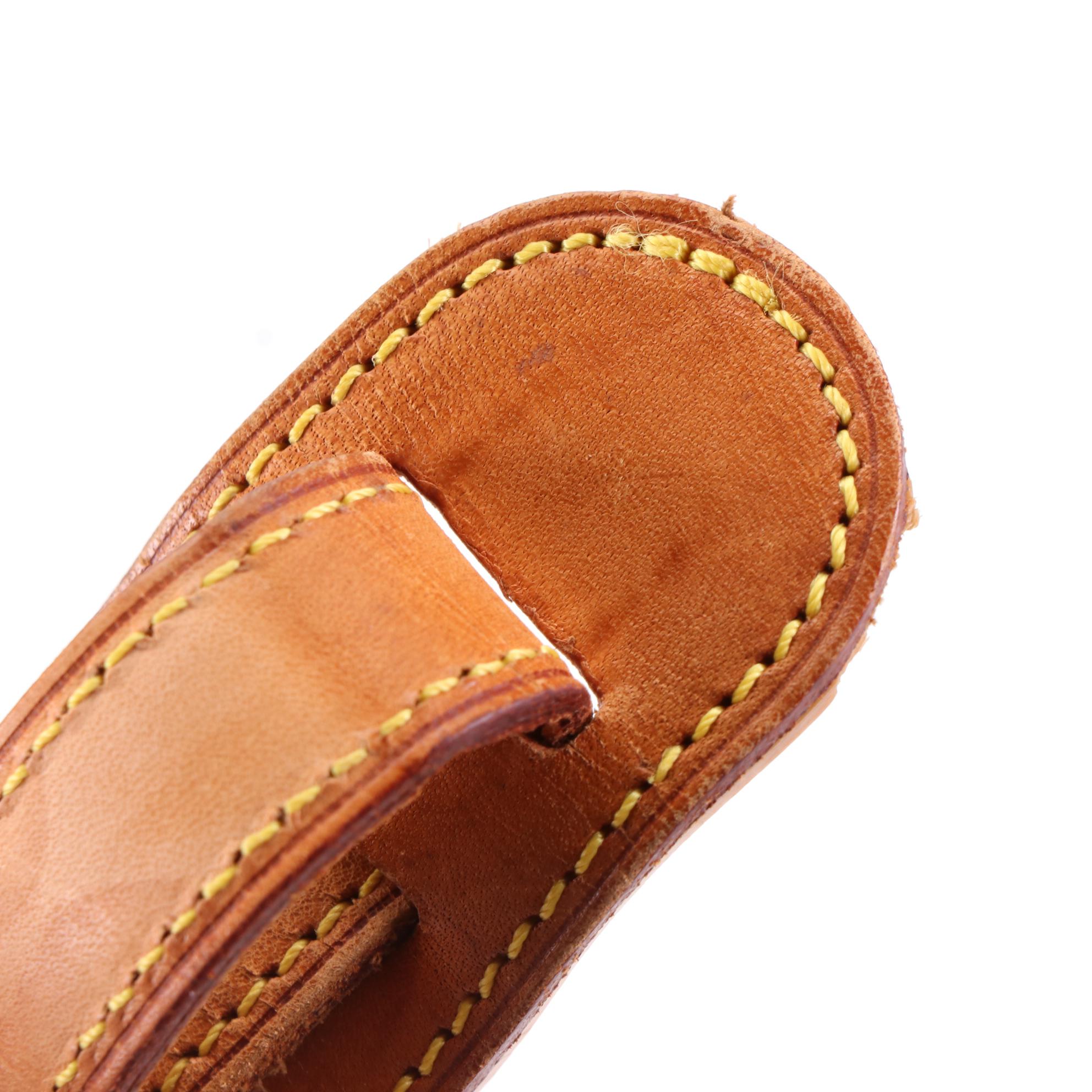 Louis Vuitton Saumur 30 in Monogram Canvas and Vachetta Leather