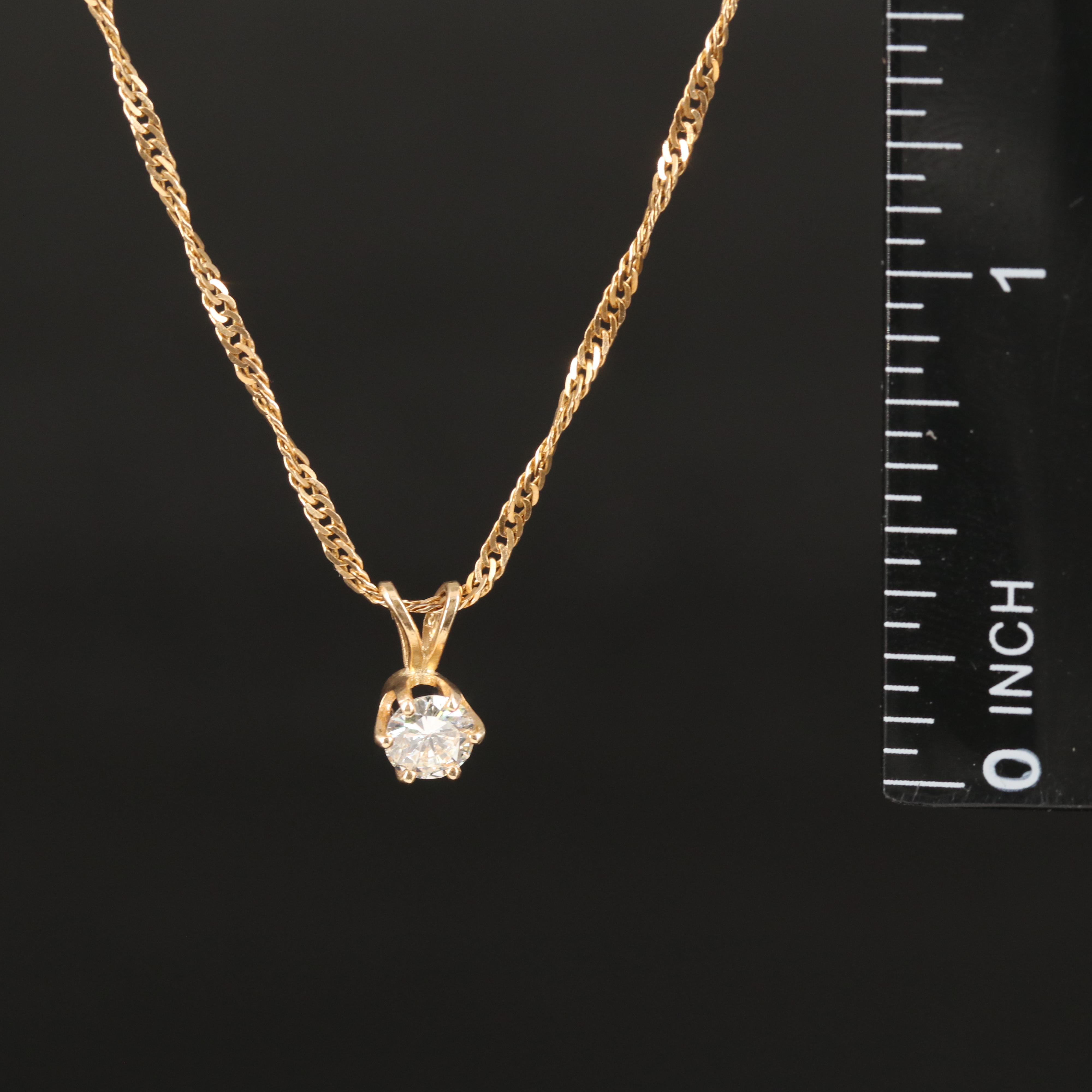 0.38 CT Diamond Solitaire Pendant on Singapore Chain Necklace in 14K